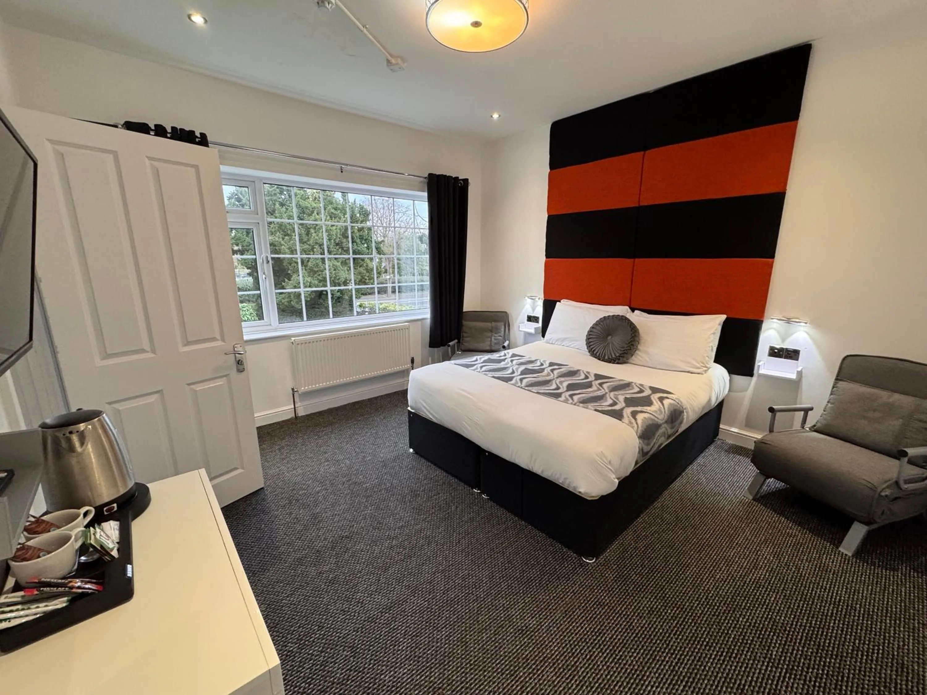 Bed in Charnwood Regency Guest House