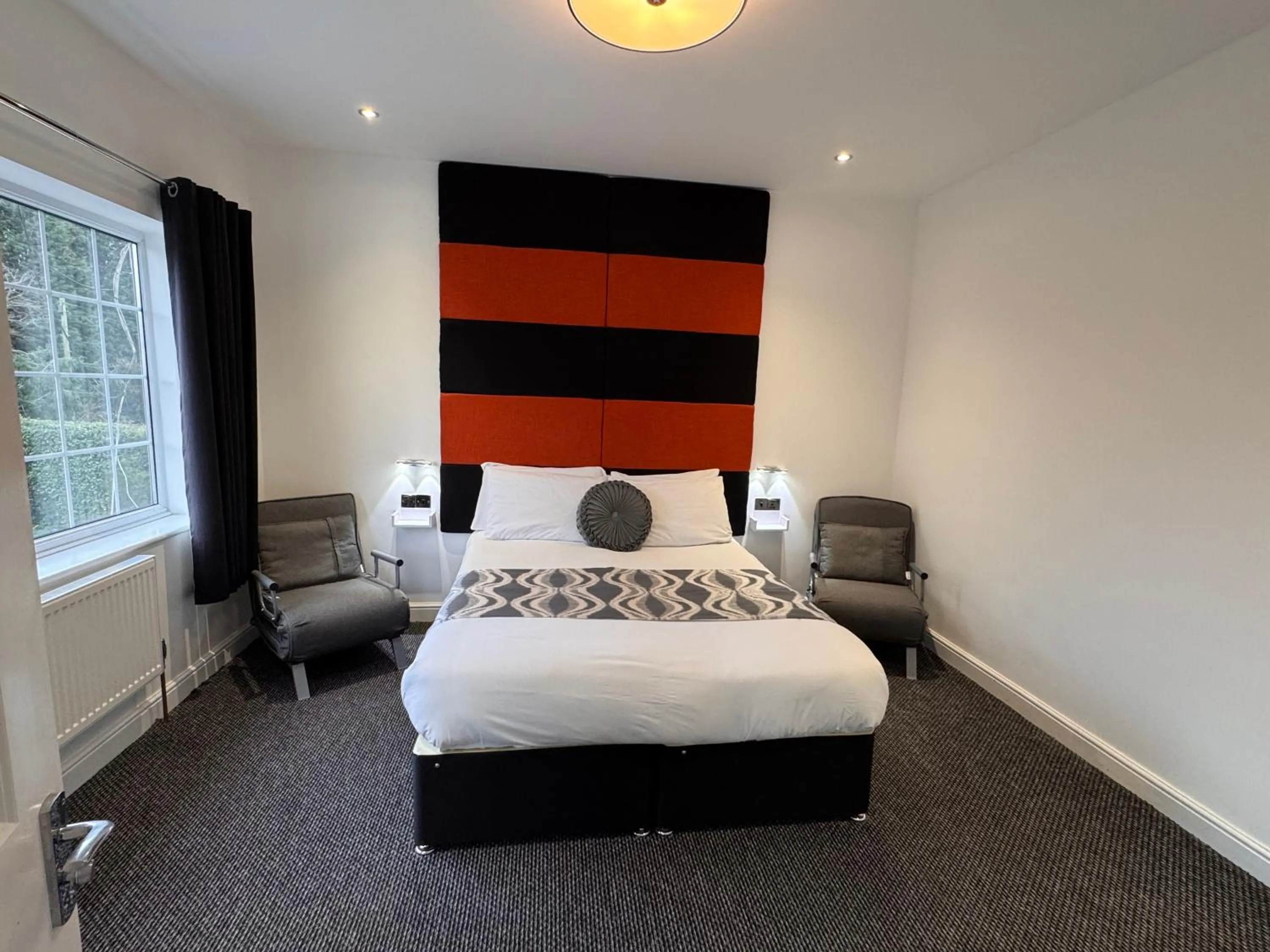 Bed in Charnwood Regency Guest House