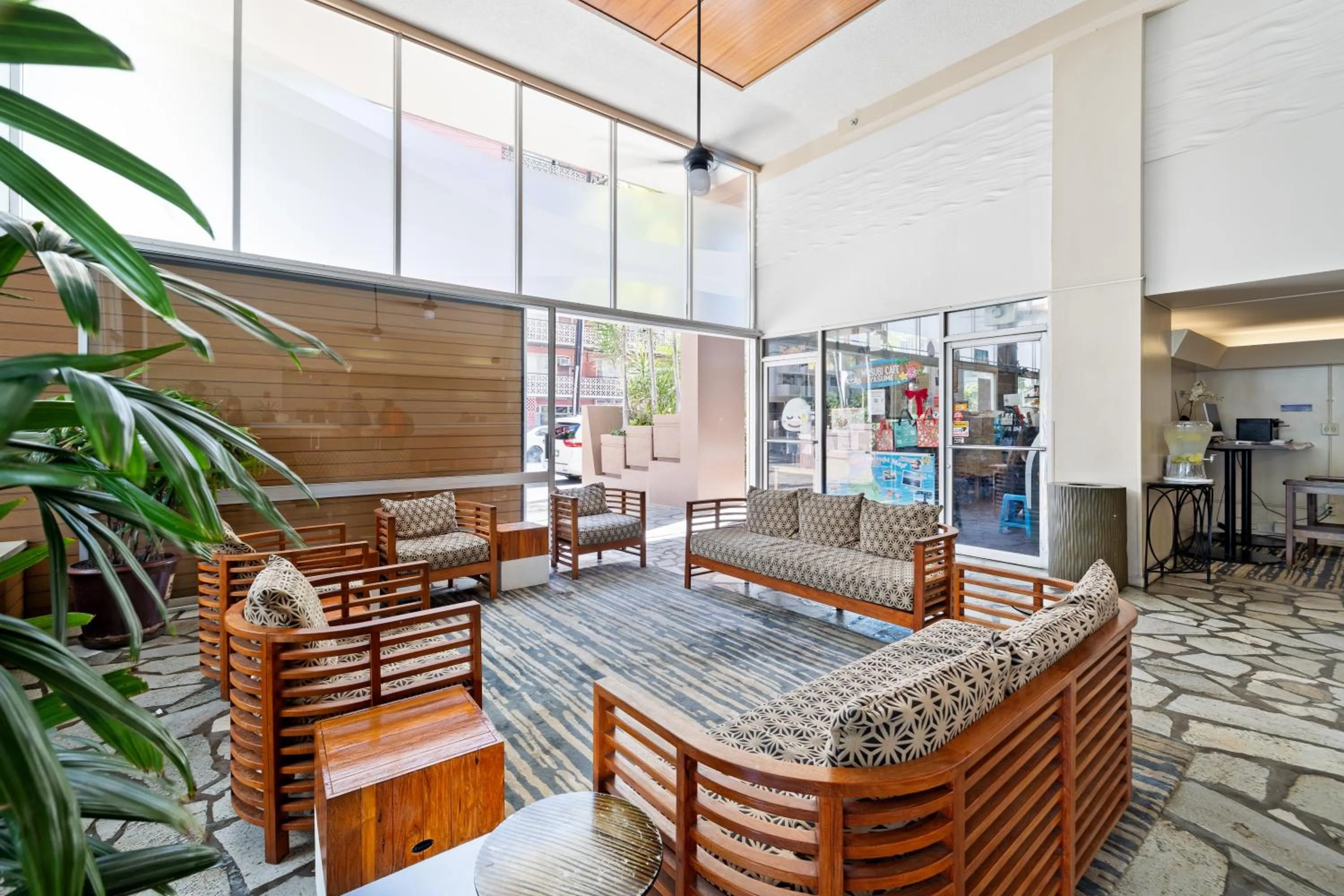 Seating area in Steps to Waikiki Beach! Newly Renovated with 75" TV