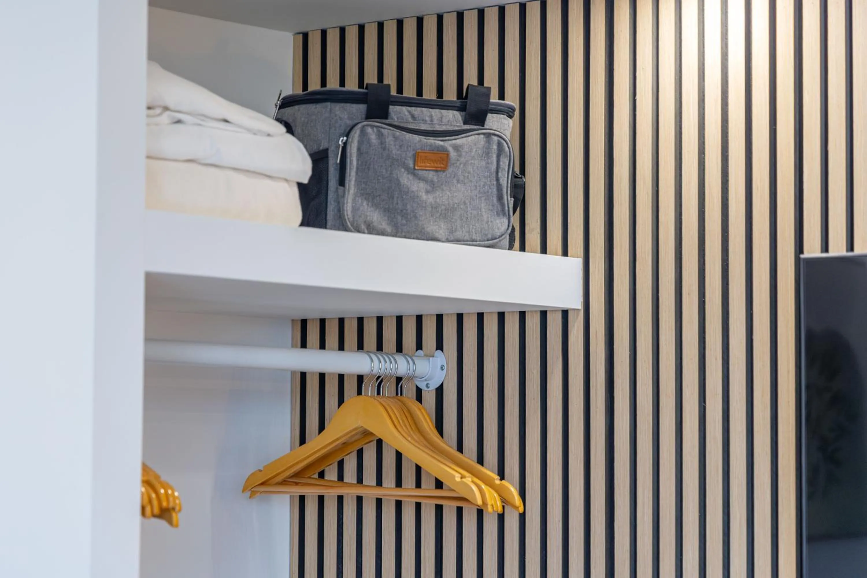 wardrobe in Steps to Waikiki Beach! Newly Renovated with 75" TV