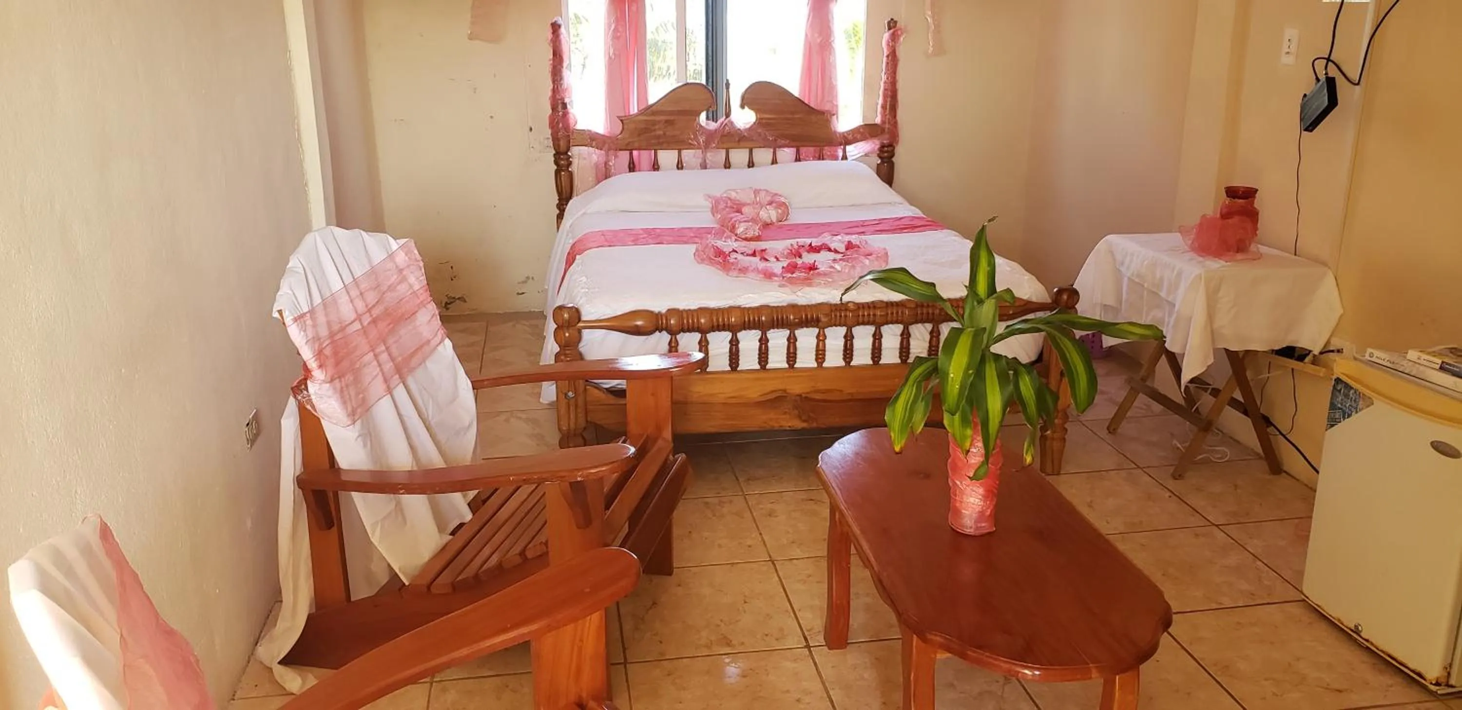 Photo of the whole room, Bed in Pal's on the beach - Dangriga, Belize