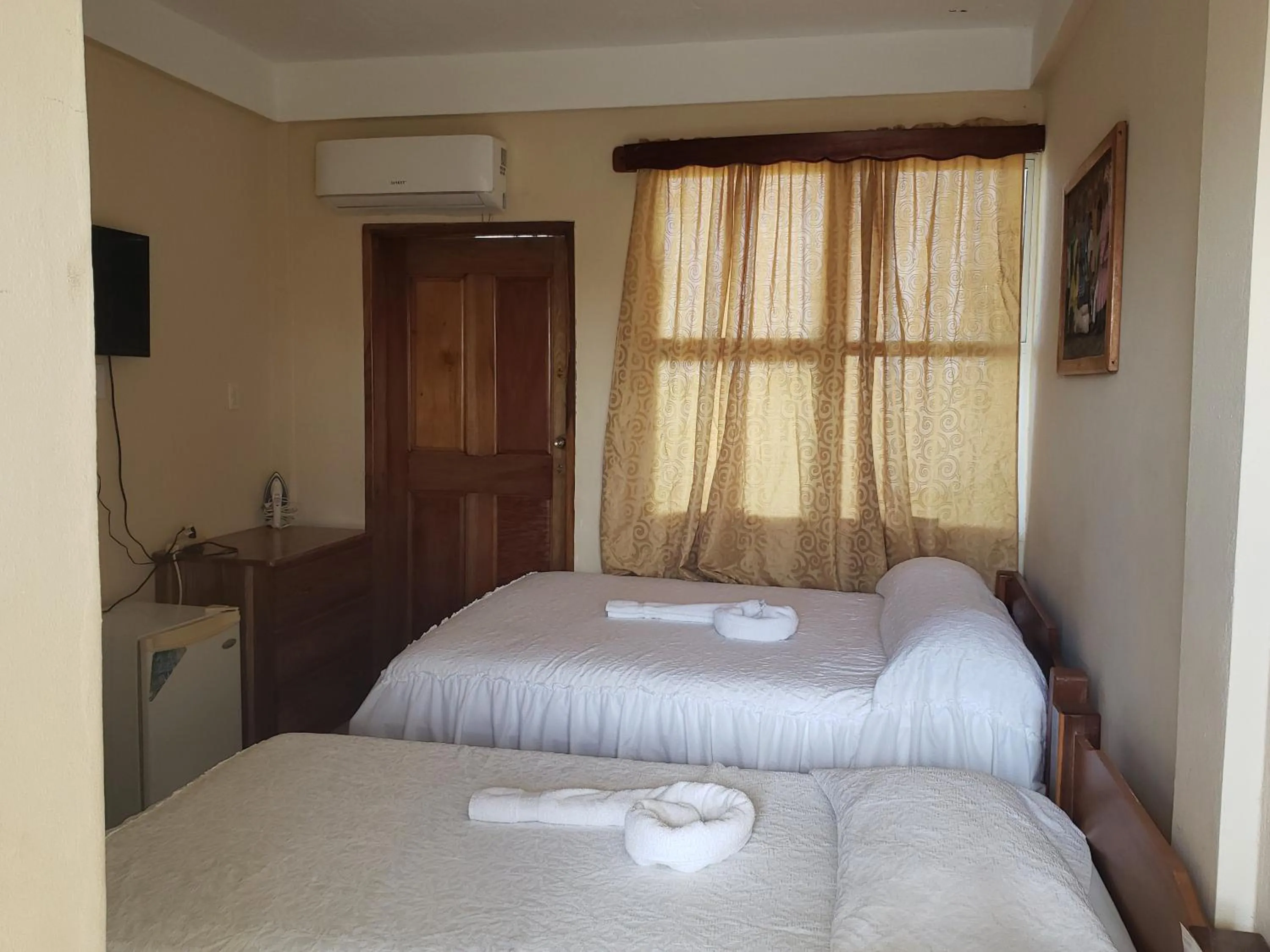 Photo of the whole room, Bed in Pal's on the beach - Dangriga, Belize