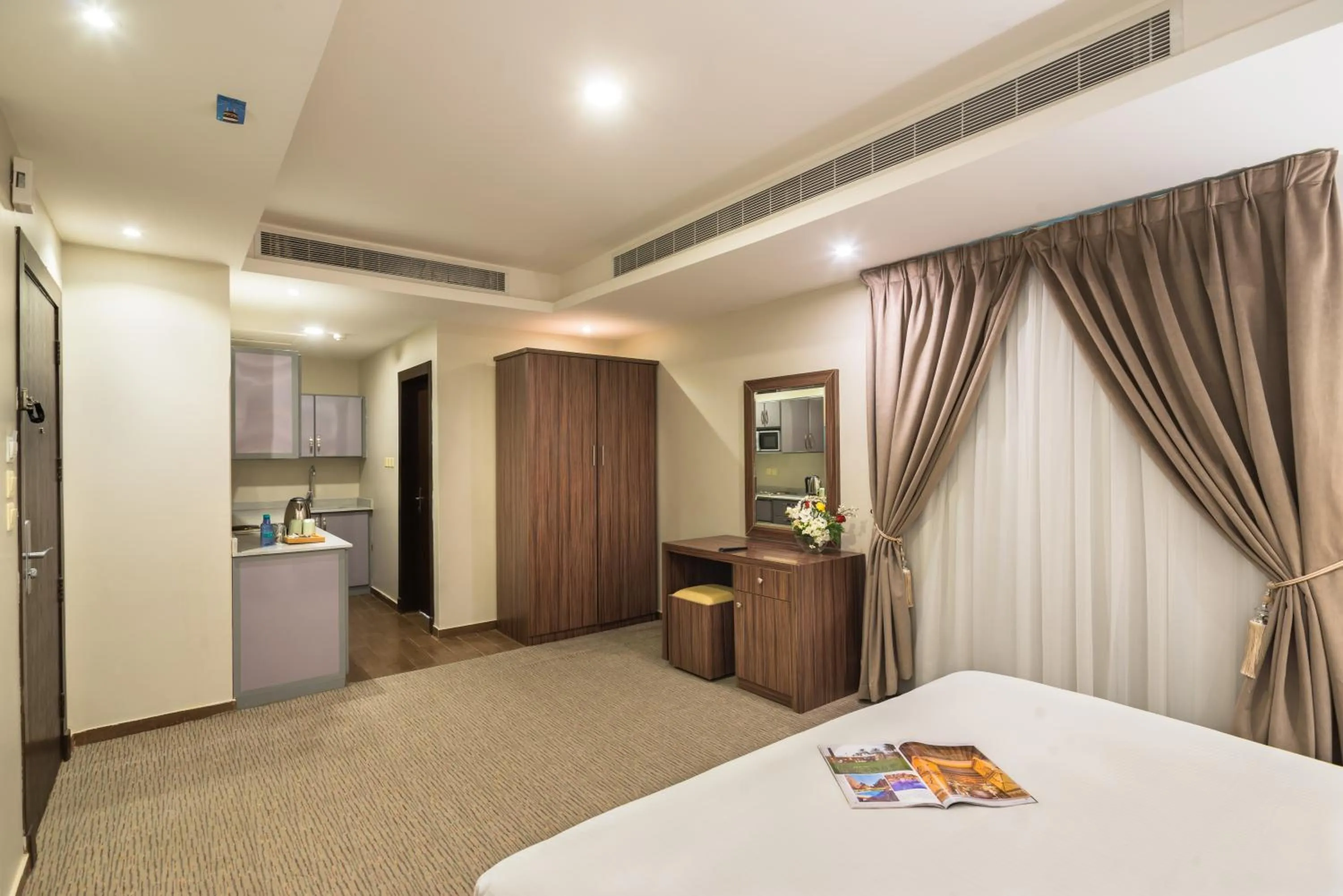 Photo of the whole room, Bed in Myrtle Al Shohadaa Serviced Apartments