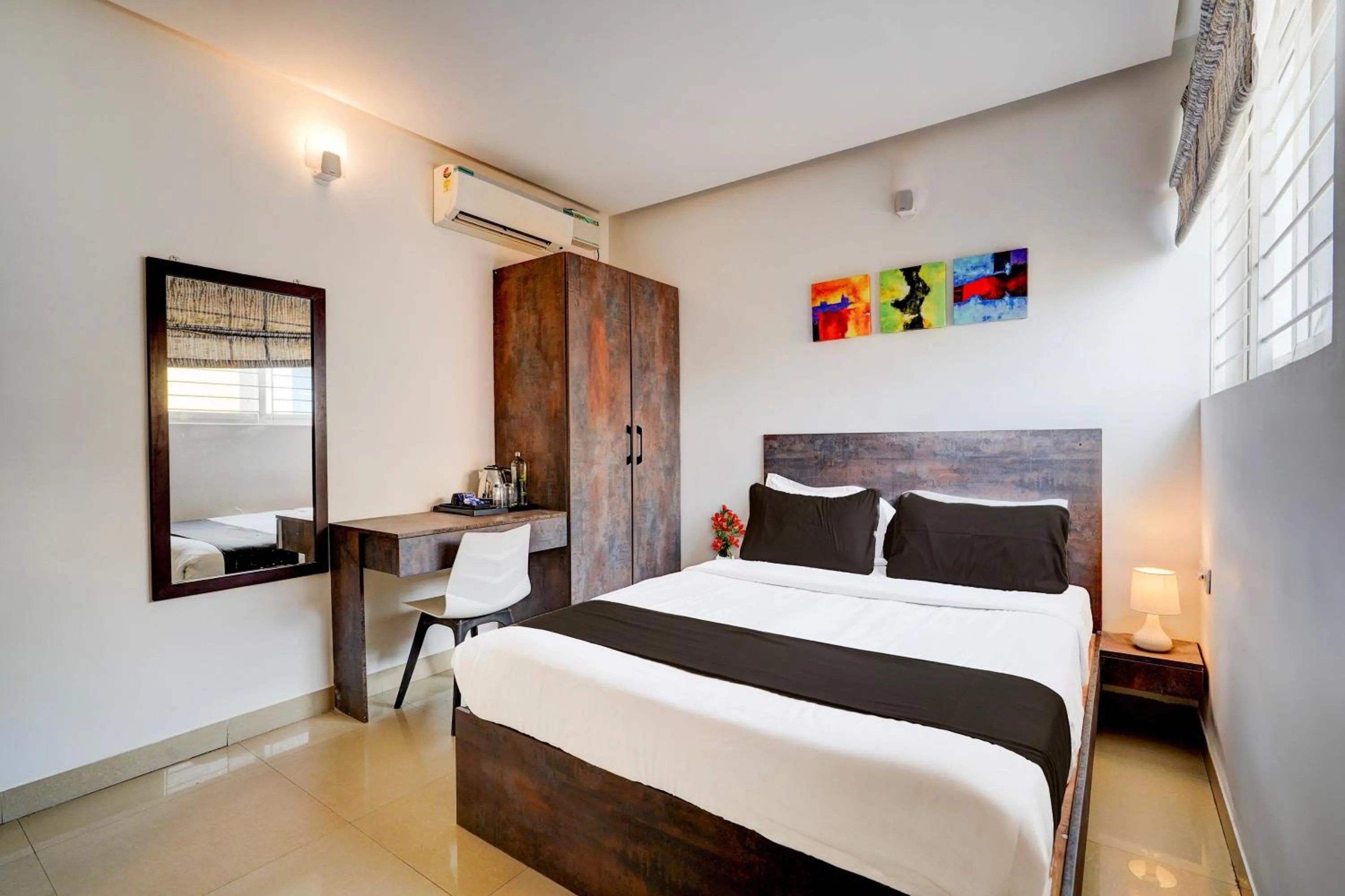 Bedroom, Bed in Super Townhouse Hebbal