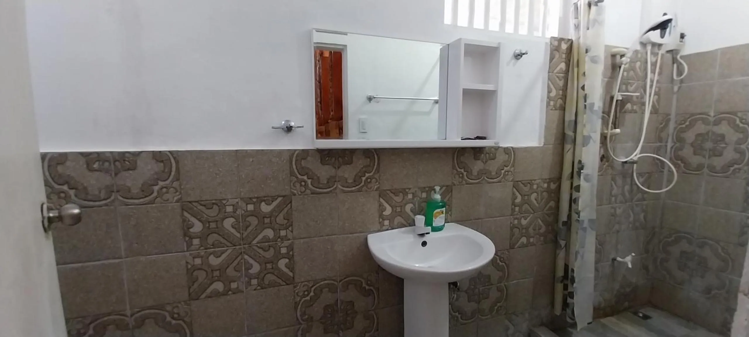 Shower in The Shark's Tail Dive Resort