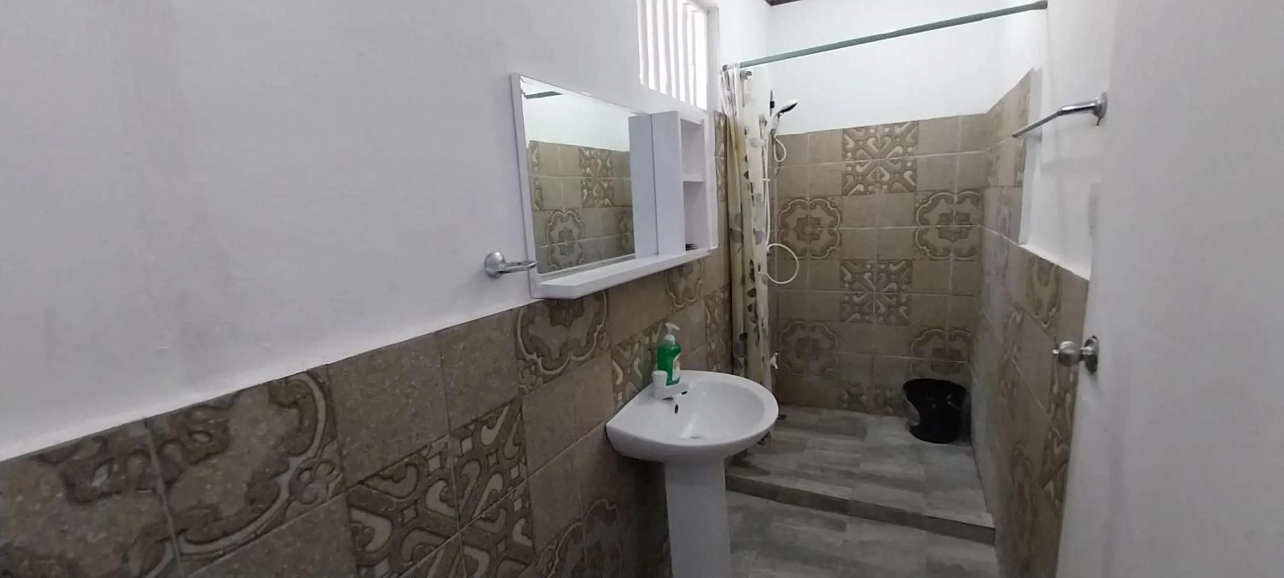 Shower in The Shark's Tail Dive Resort