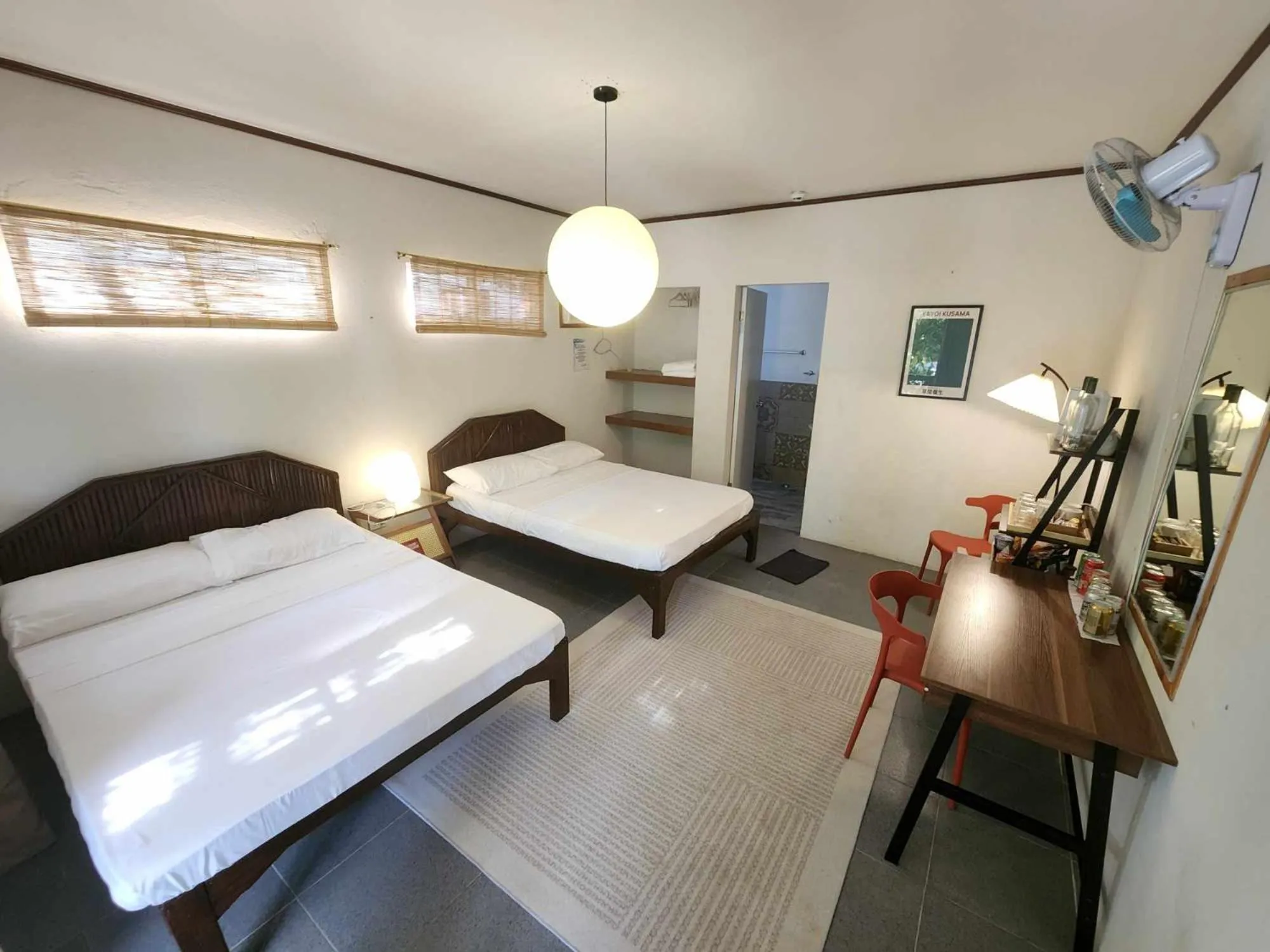 Bed in The Shark's Tail Dive Resort