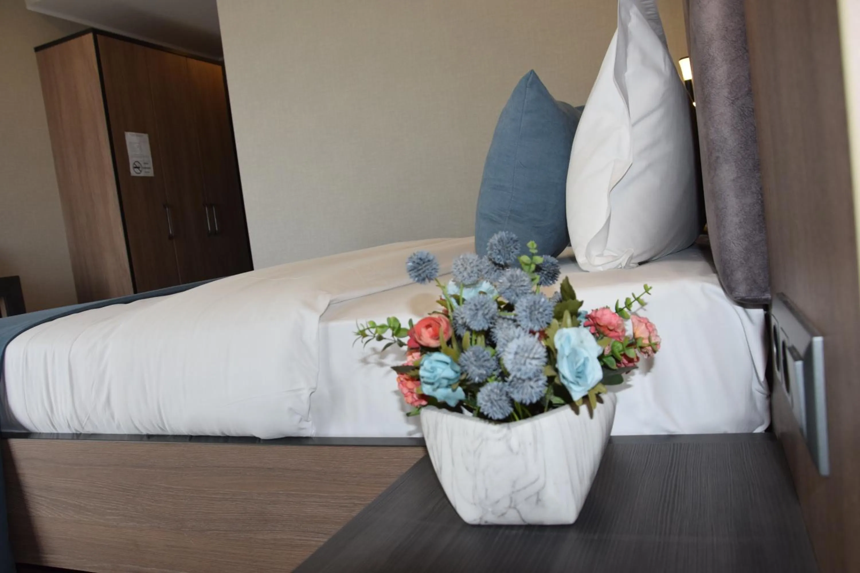 Bed in Sara Hotel Bishkek