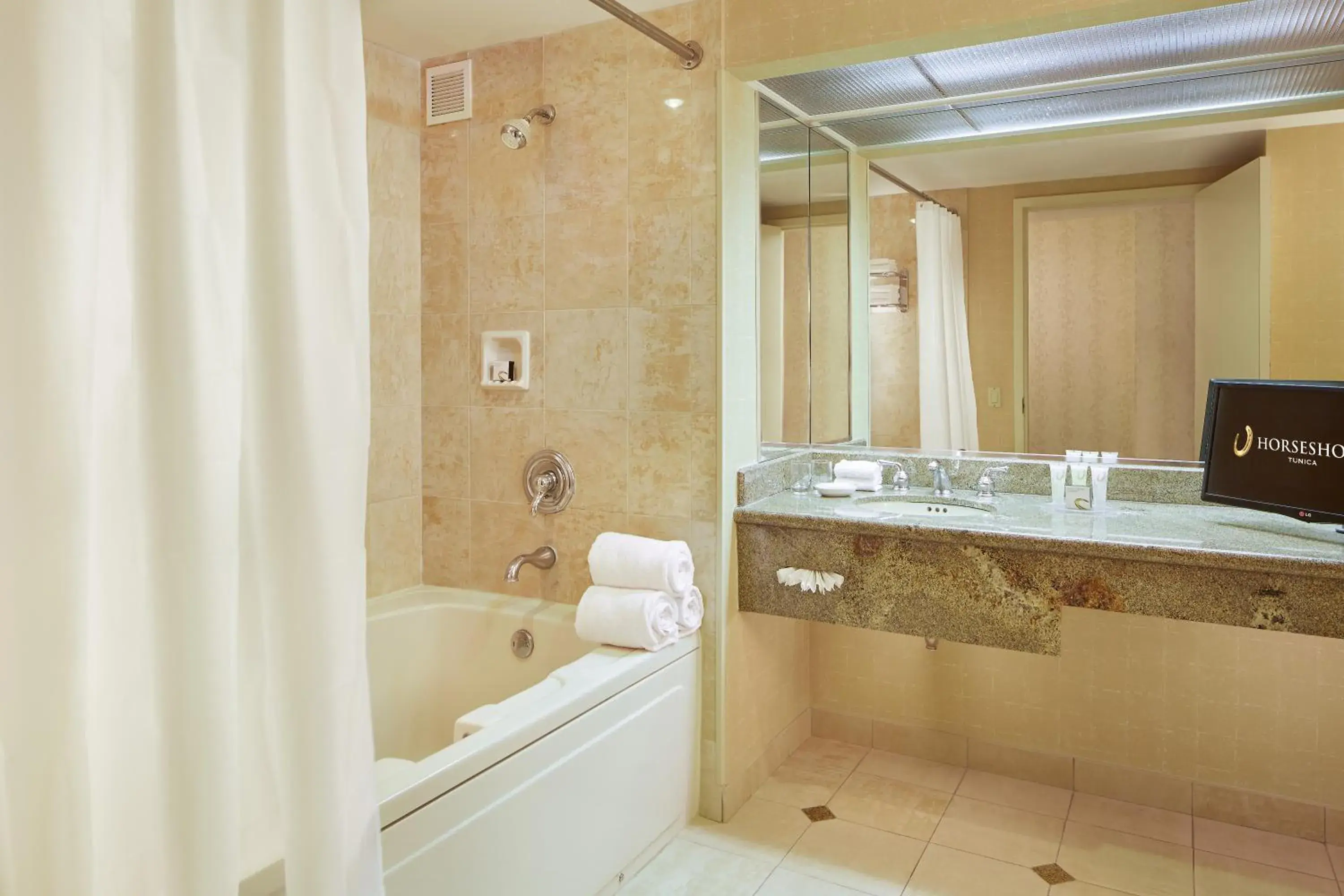 Premium King Room - Smoking in Horseshoe Tunica, A Caesars Destination Premium King Room - Smoking in Horseshoe Tunica, A Caesars Destination