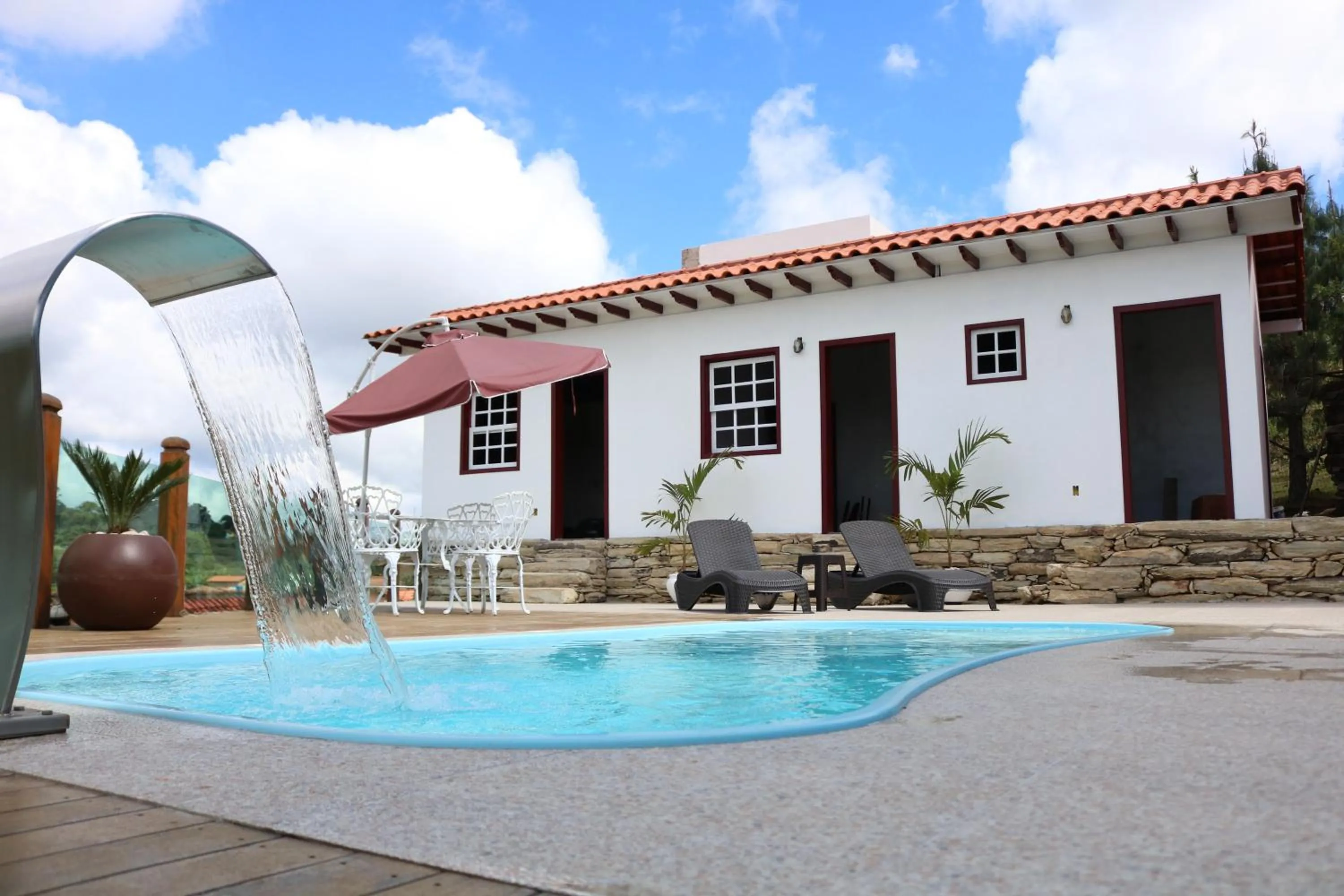 Pool view in Biz & Biu Pousada Lavras Novas