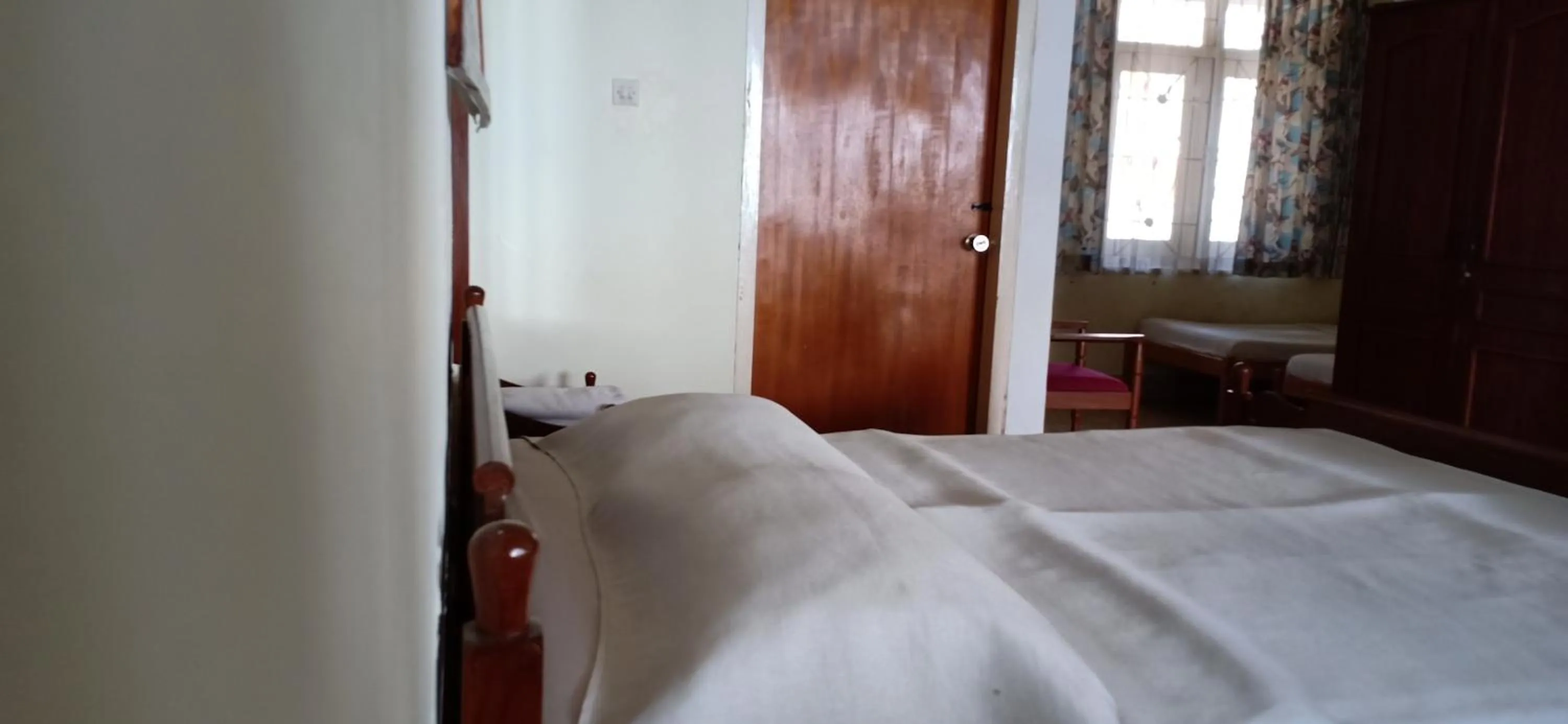 Bed in Bunga Ayu Seaside Resort