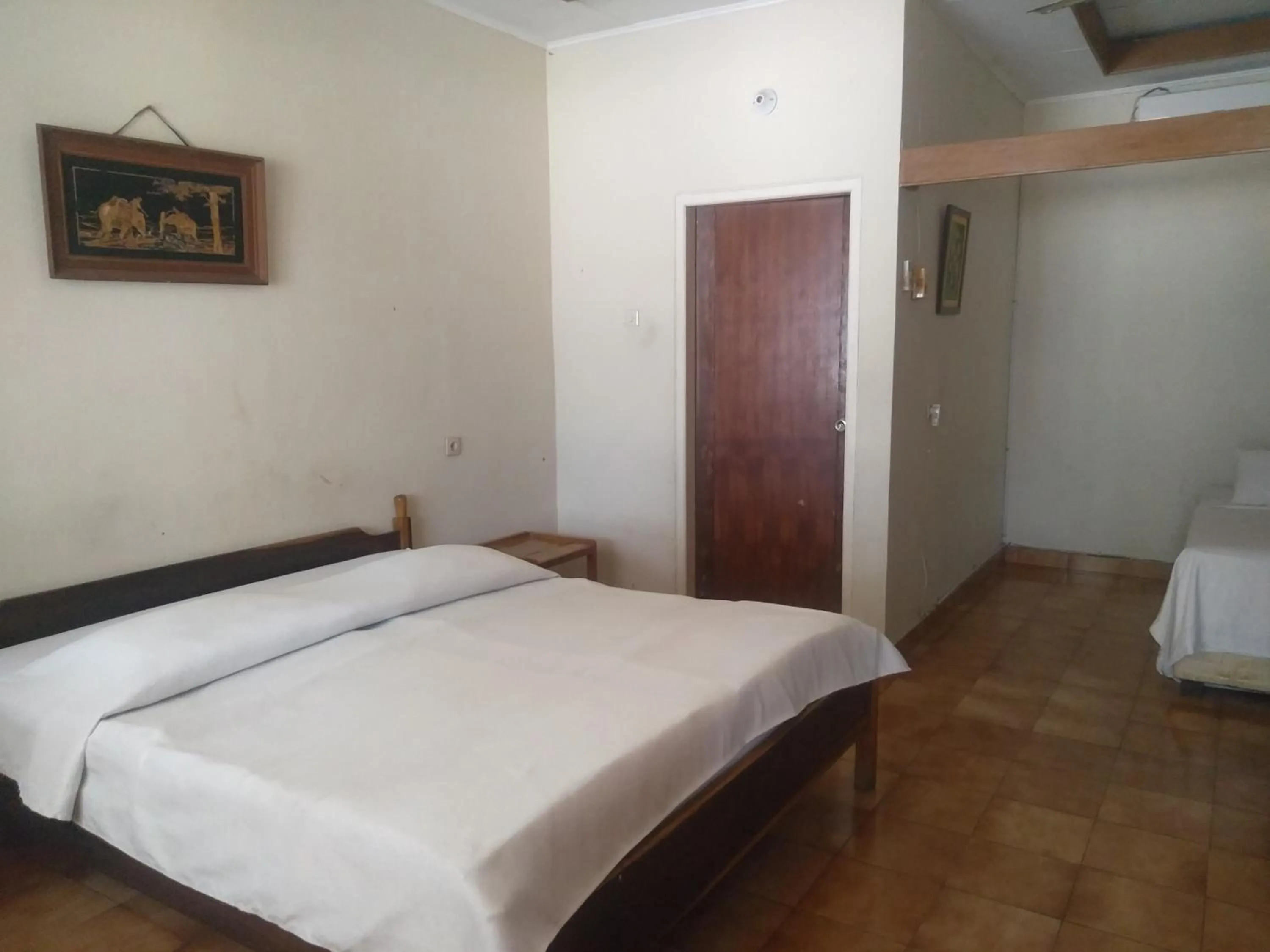 Bed in Bunga Ayu Seaside Resort