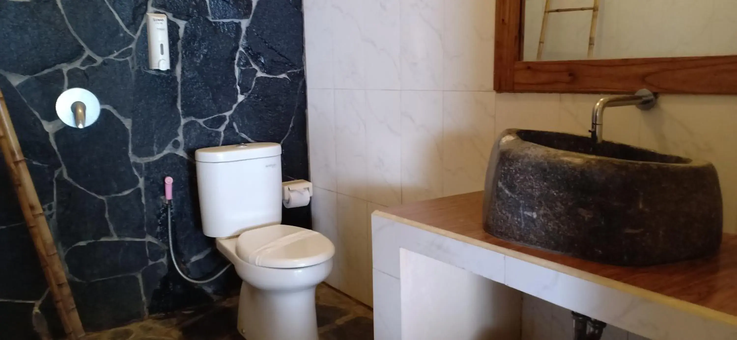 Standard Triple Room in Bunga Ayu Seaside Resort Standard Triple Room in Bunga Ayu Seaside Resort