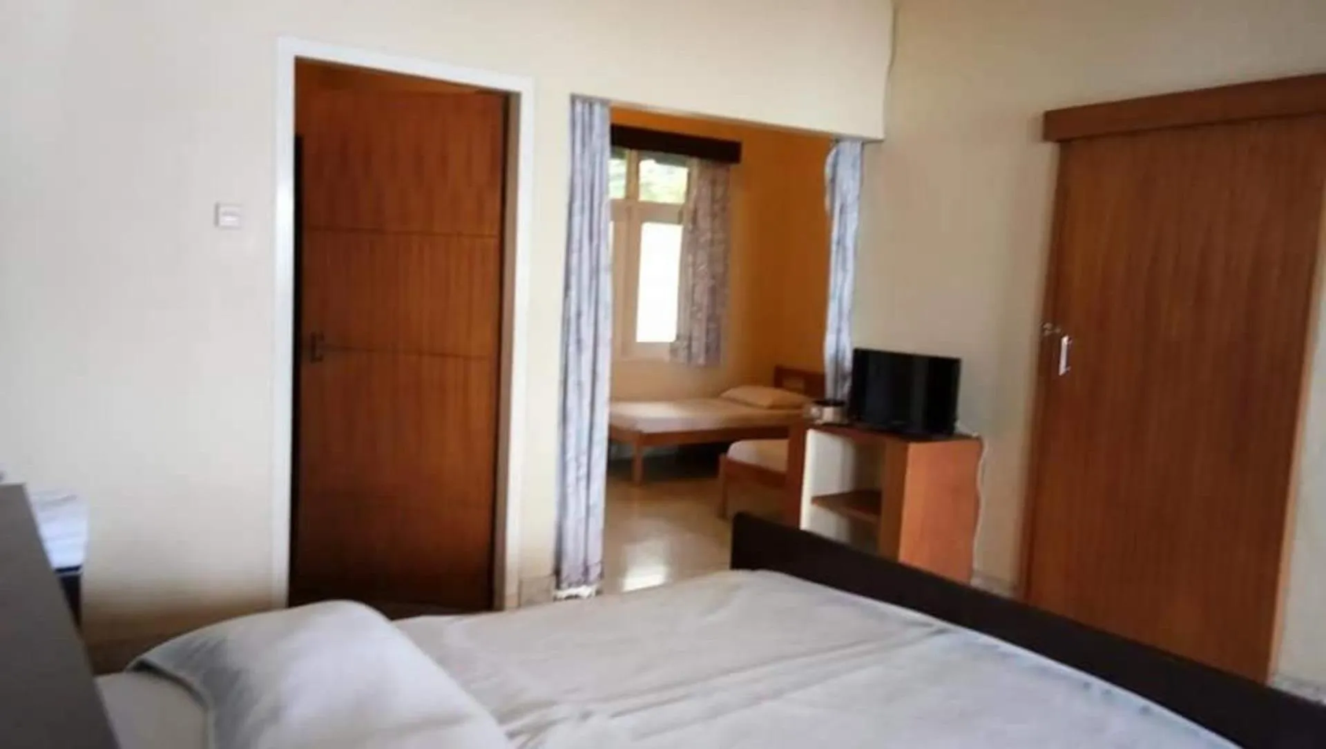 Bed in Bunga Ayu Seaside Resort