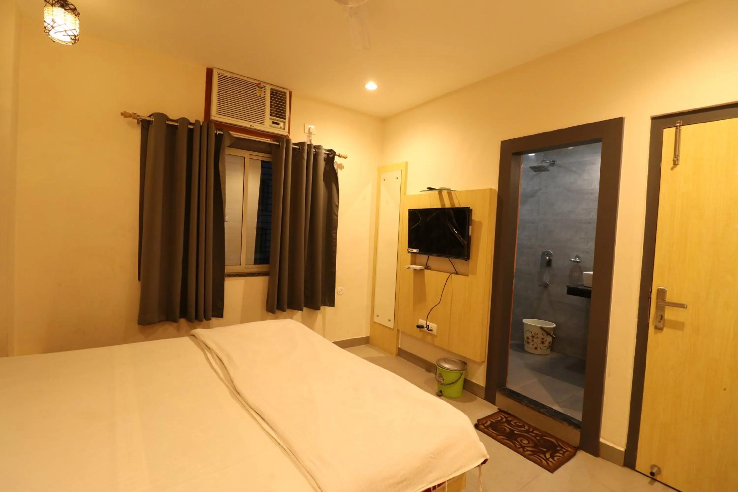 Photo of the whole room, Bed in HOTEL PRATAP GRAND