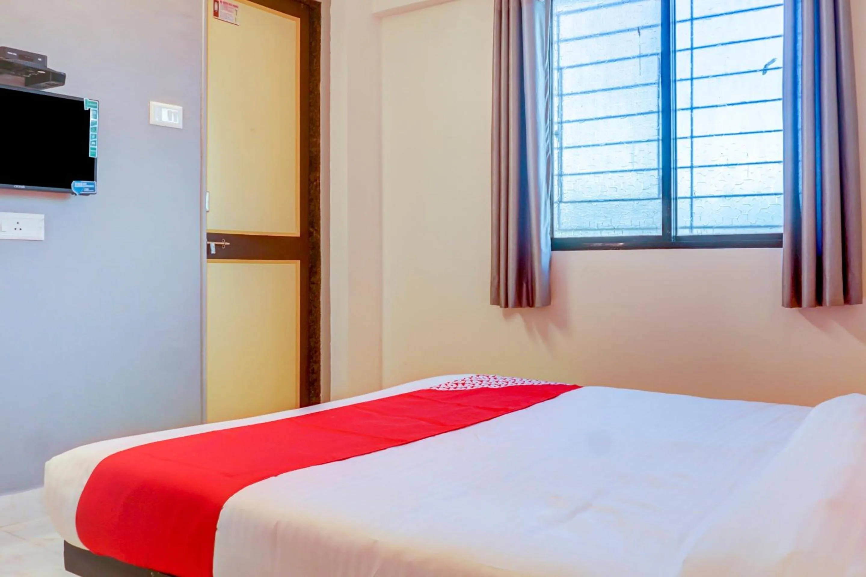 Bedroom in Hotel O Sbk Icon Near Fun Time Multiplex