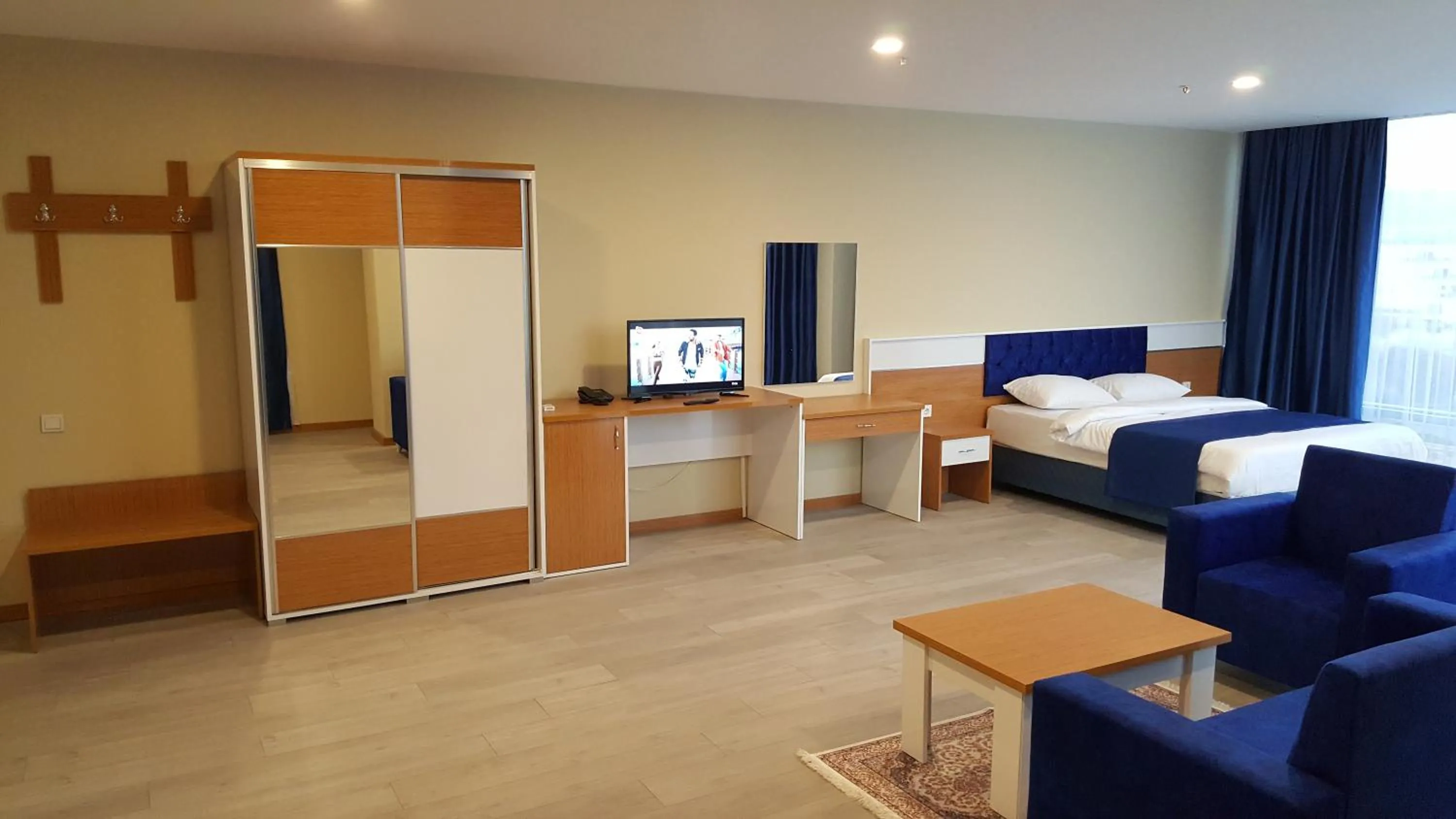 Seating area, Bed in SKYBLUE İSTANBUL HOTEL