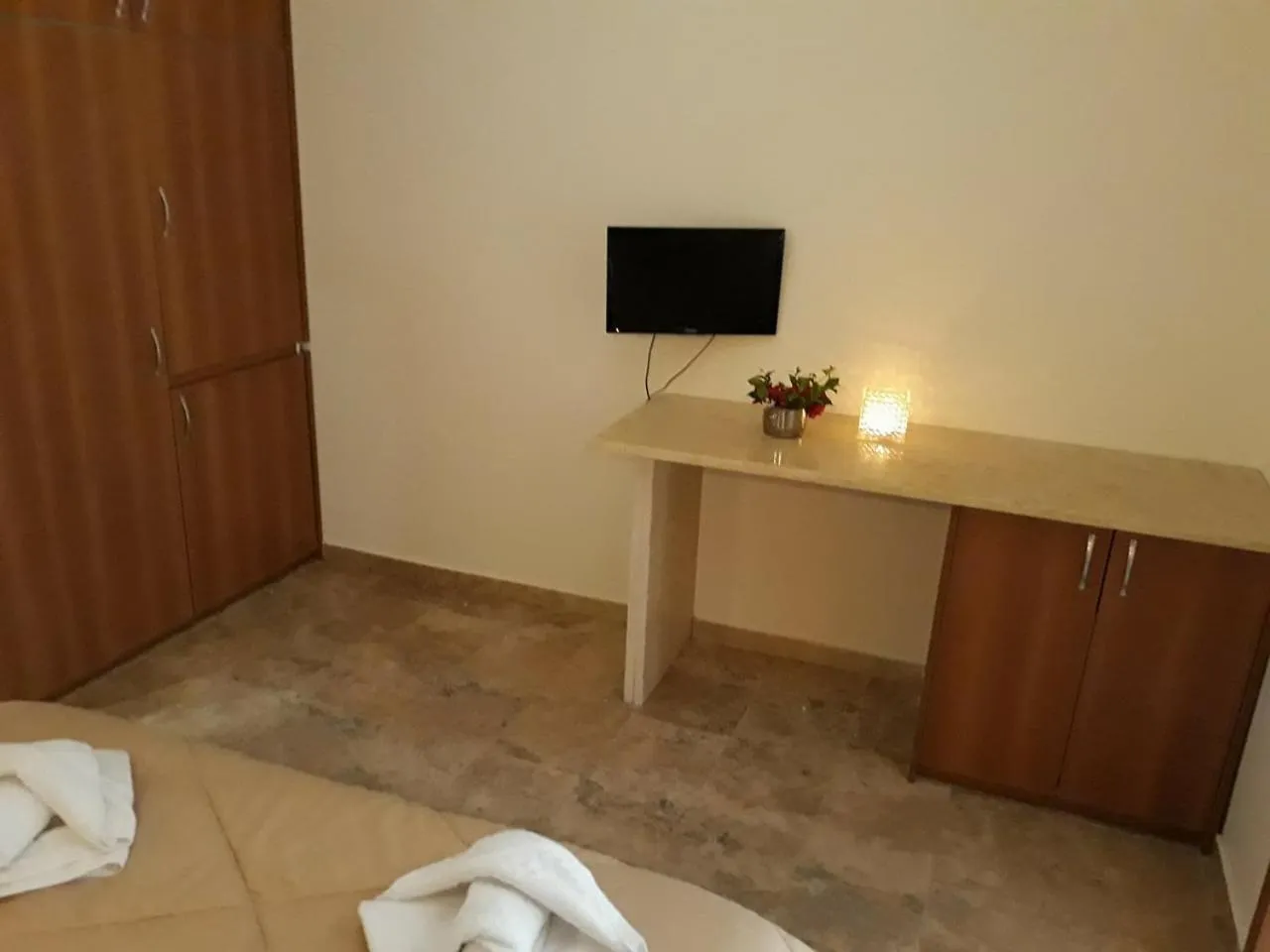 Bed in Kinira Beach Hotel