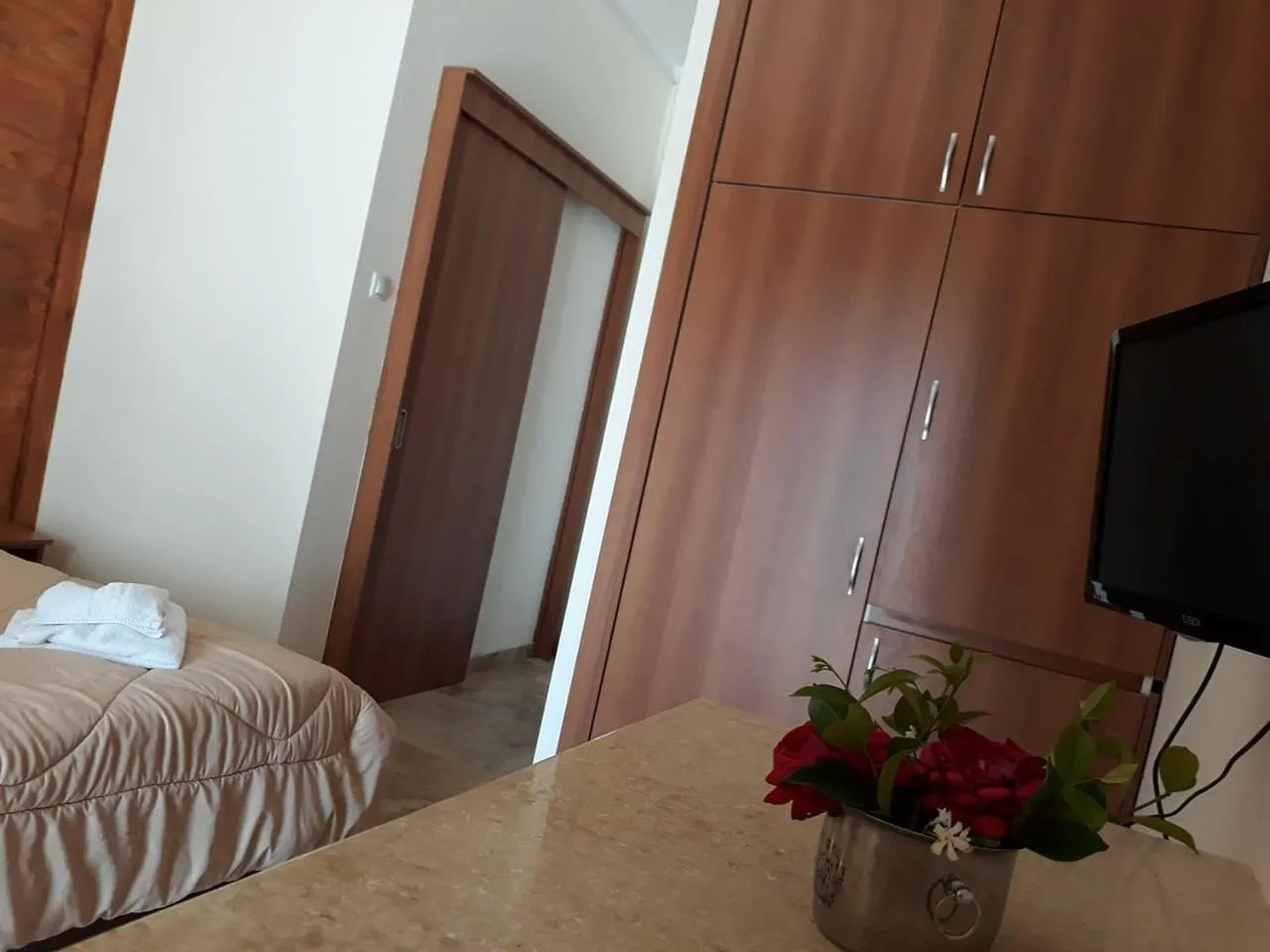 Bed in Kinira Beach Hotel