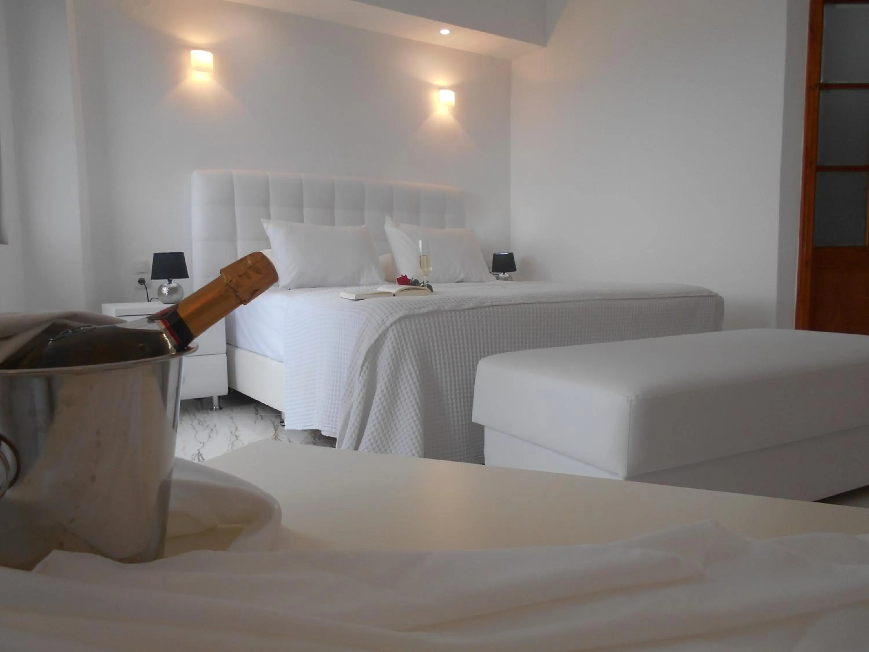 Bed in Kinira Beach Hotel