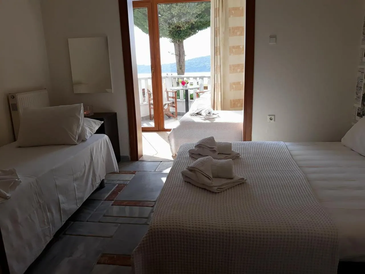 Bed in Kinira Beach Hotel