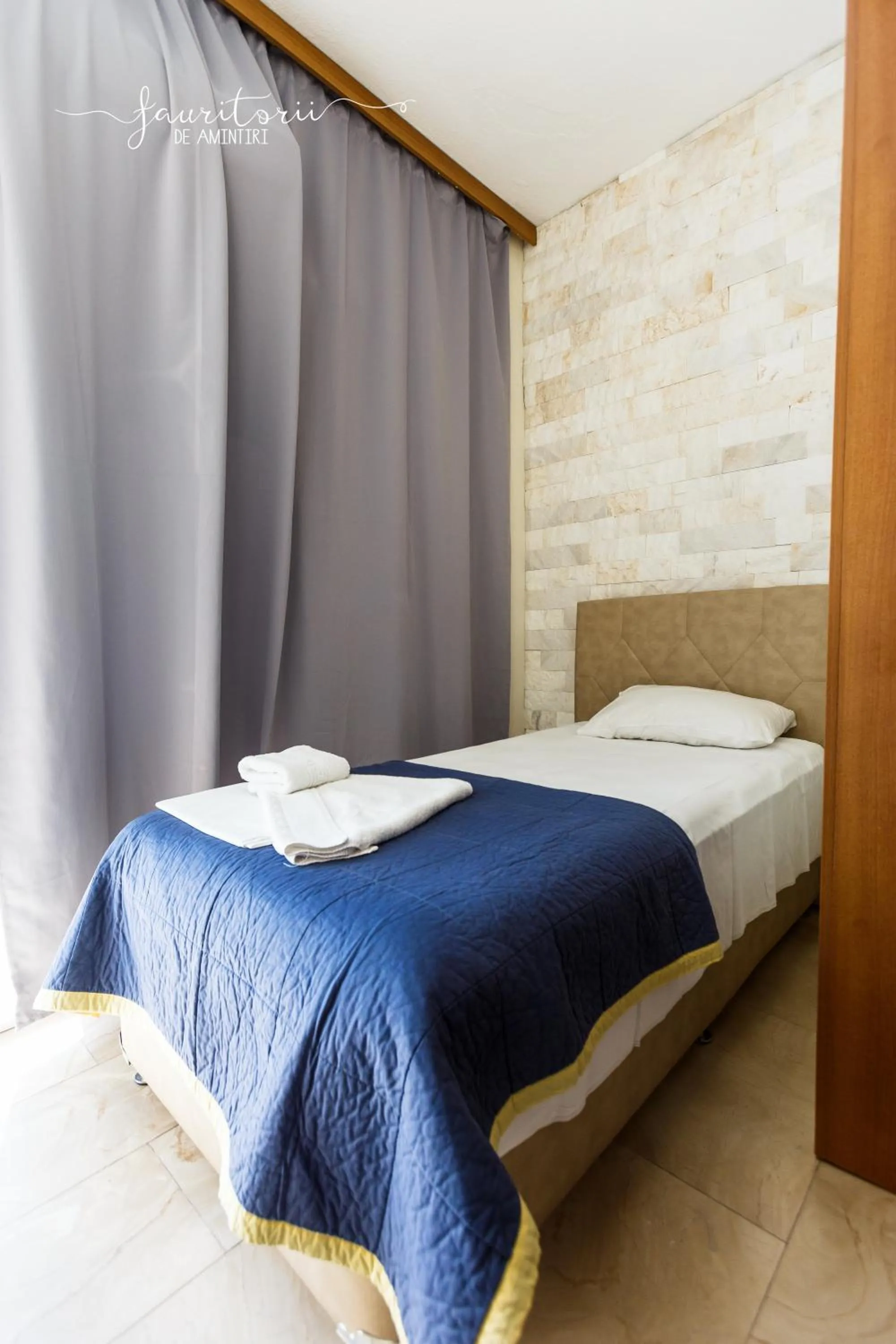 Bed in Kinira Beach Hotel