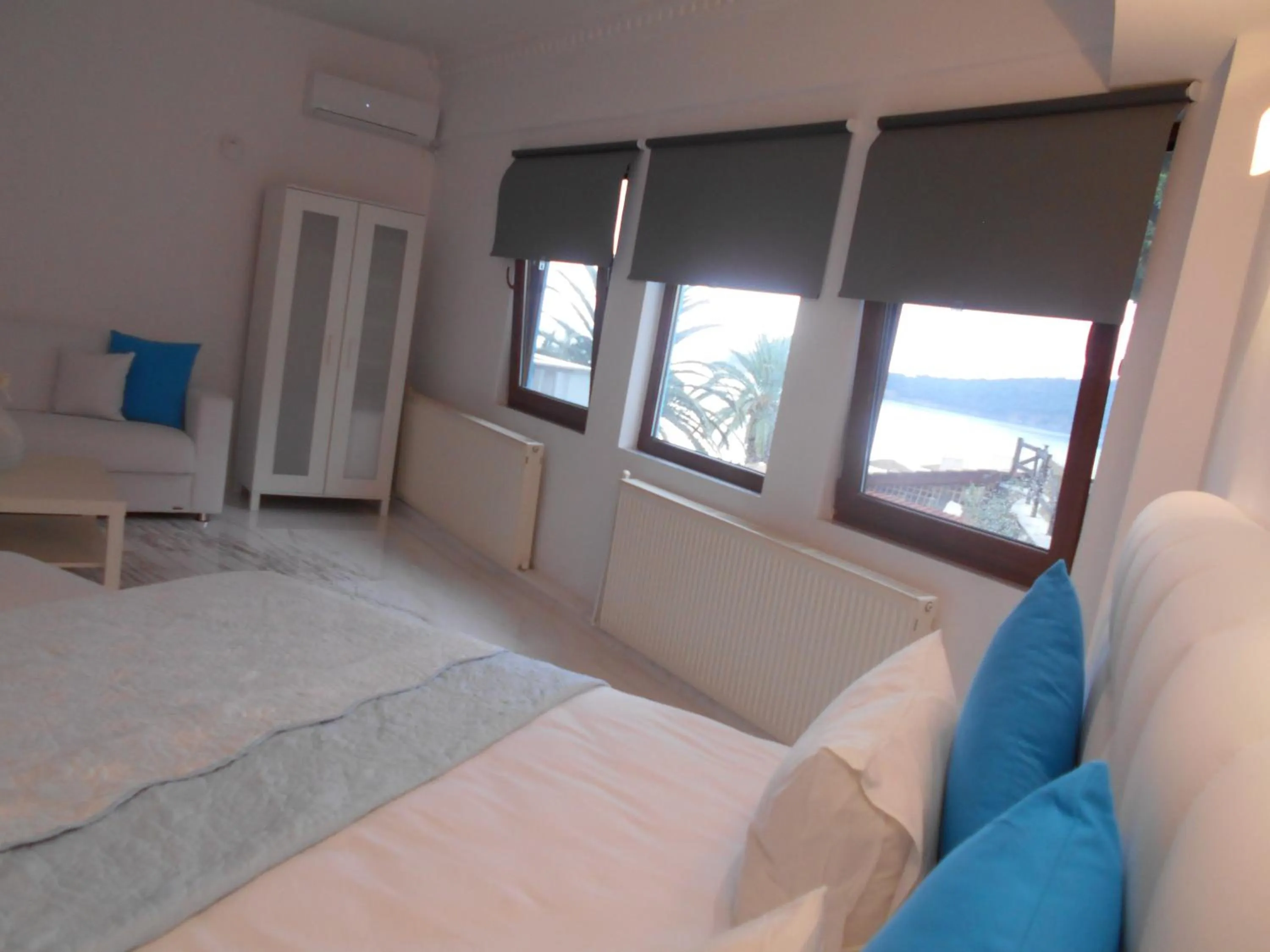 Bed in Kinira Beach Hotel