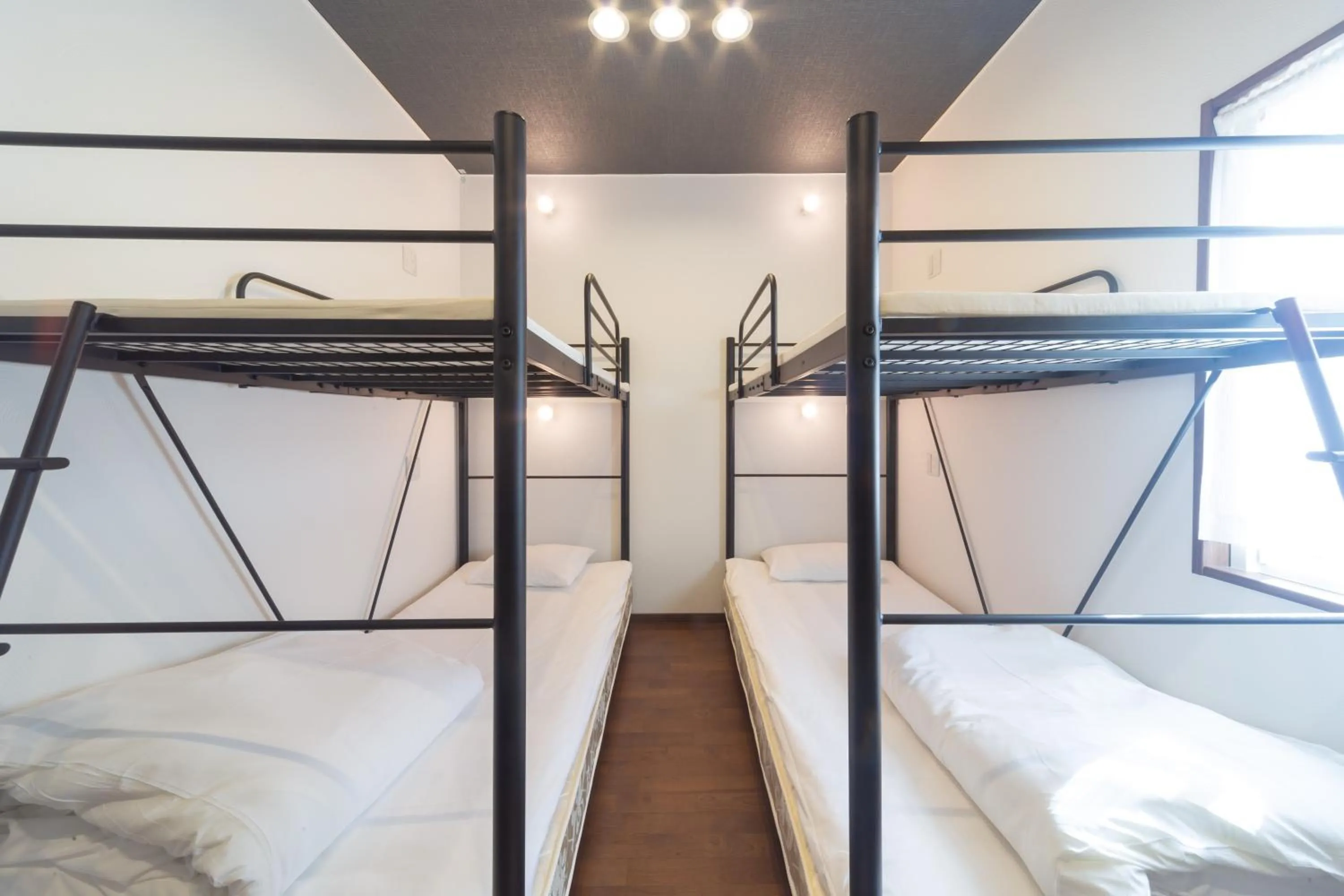 Bed in Guesthouse Nibutani Yanto