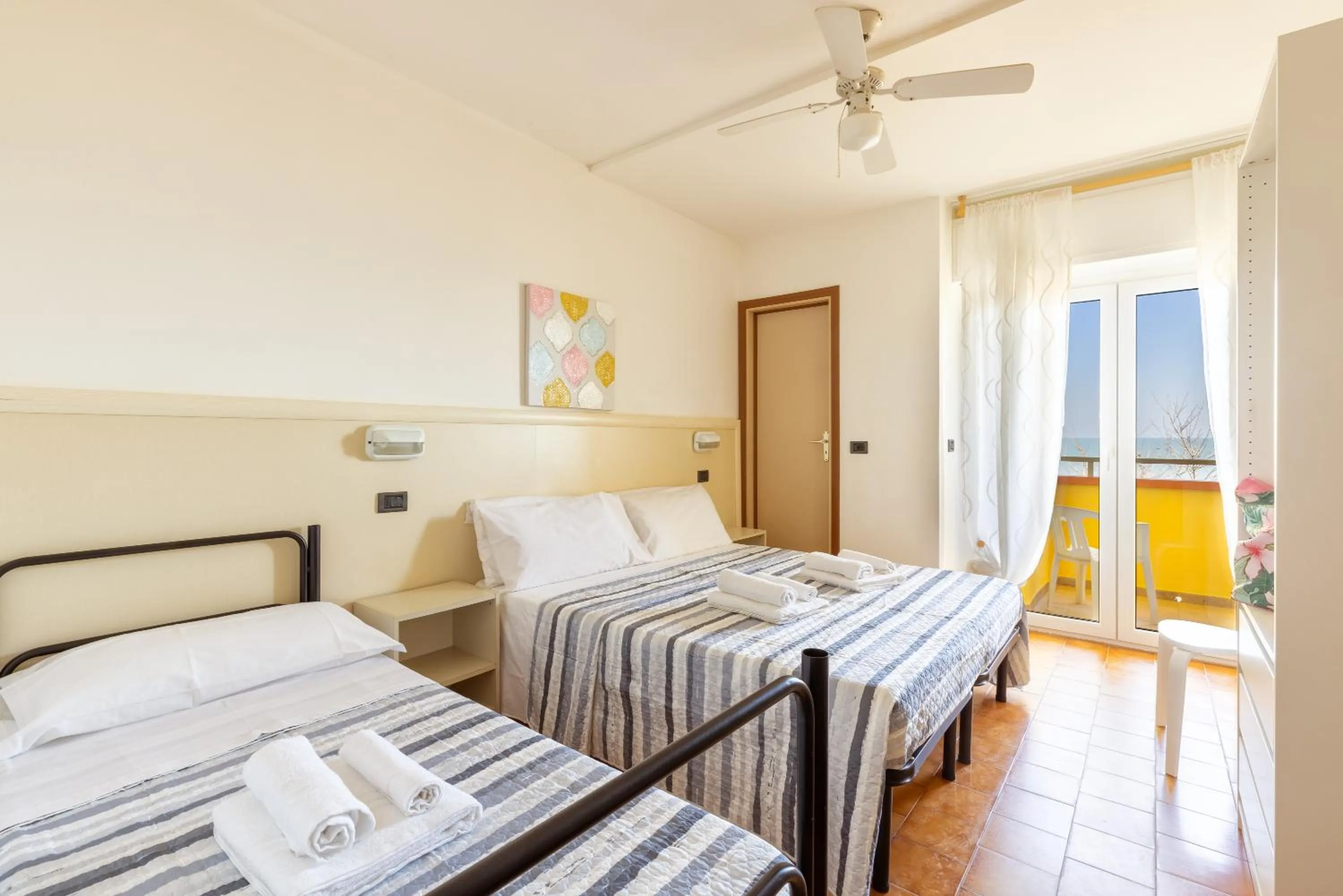 Bed in Hotel Mignon Riccione Fronte Mare