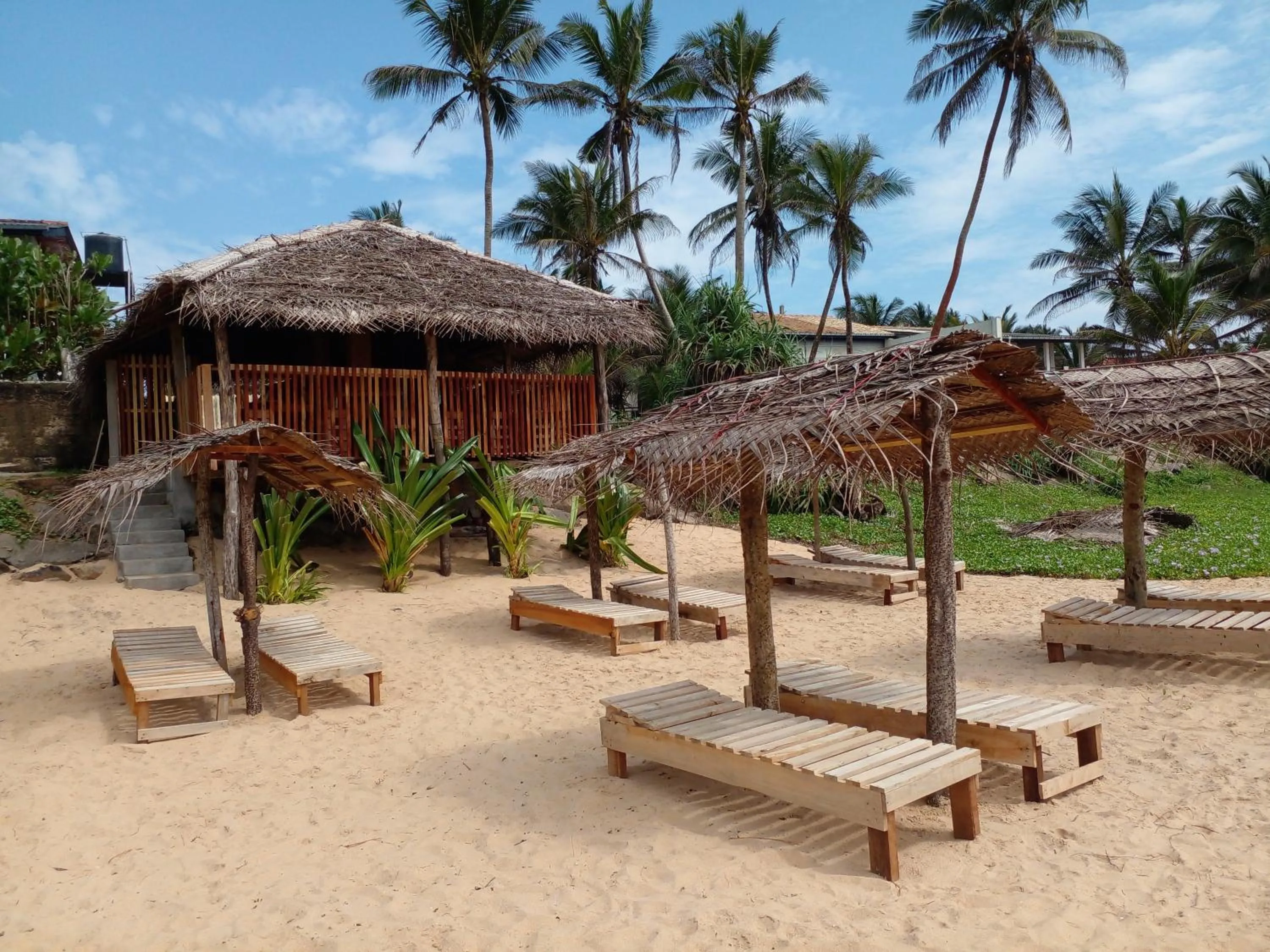 Malika's Yellow House