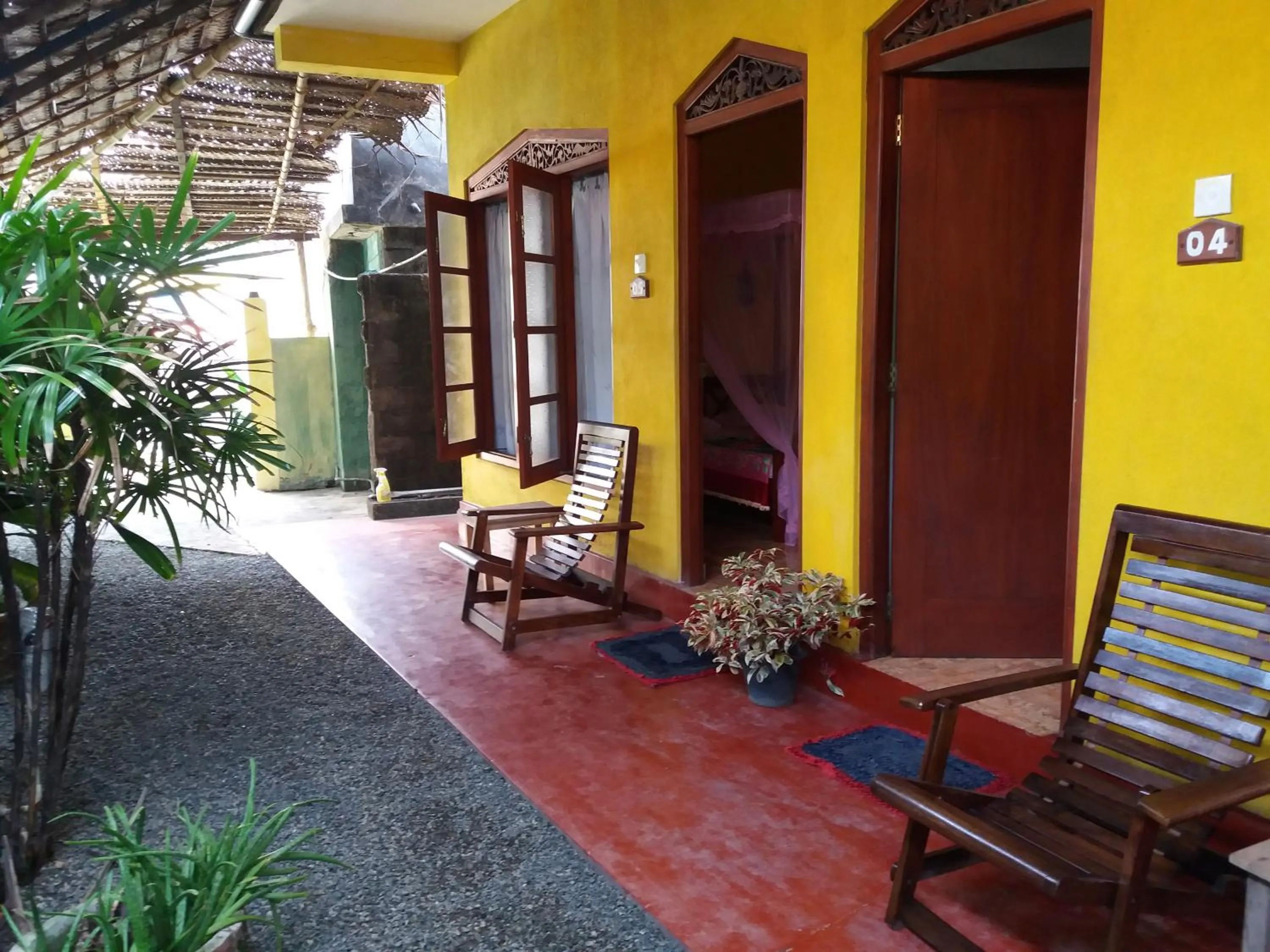 Malika's Yellow House