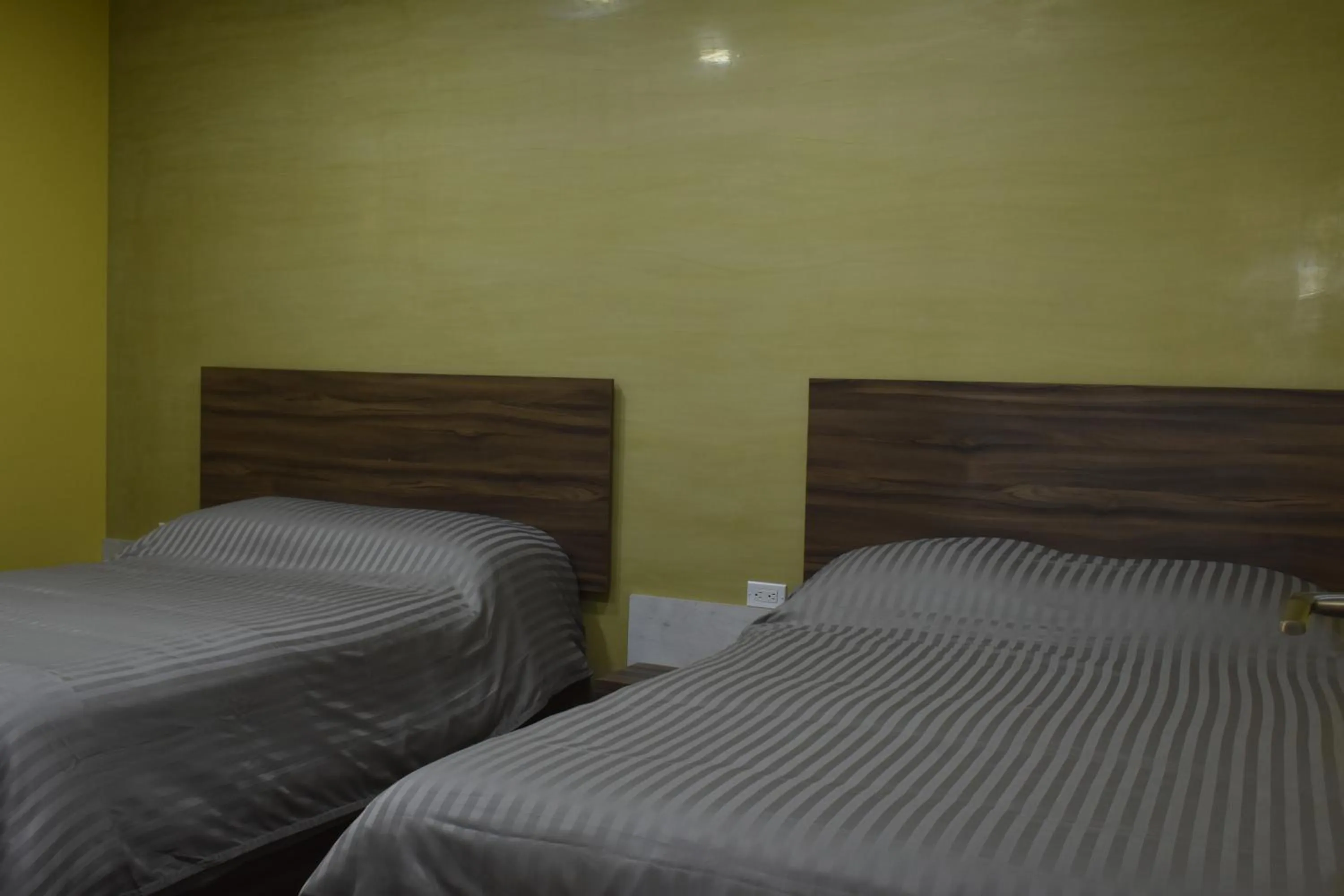 Bed in TJ Border Suites by Hosted by Me