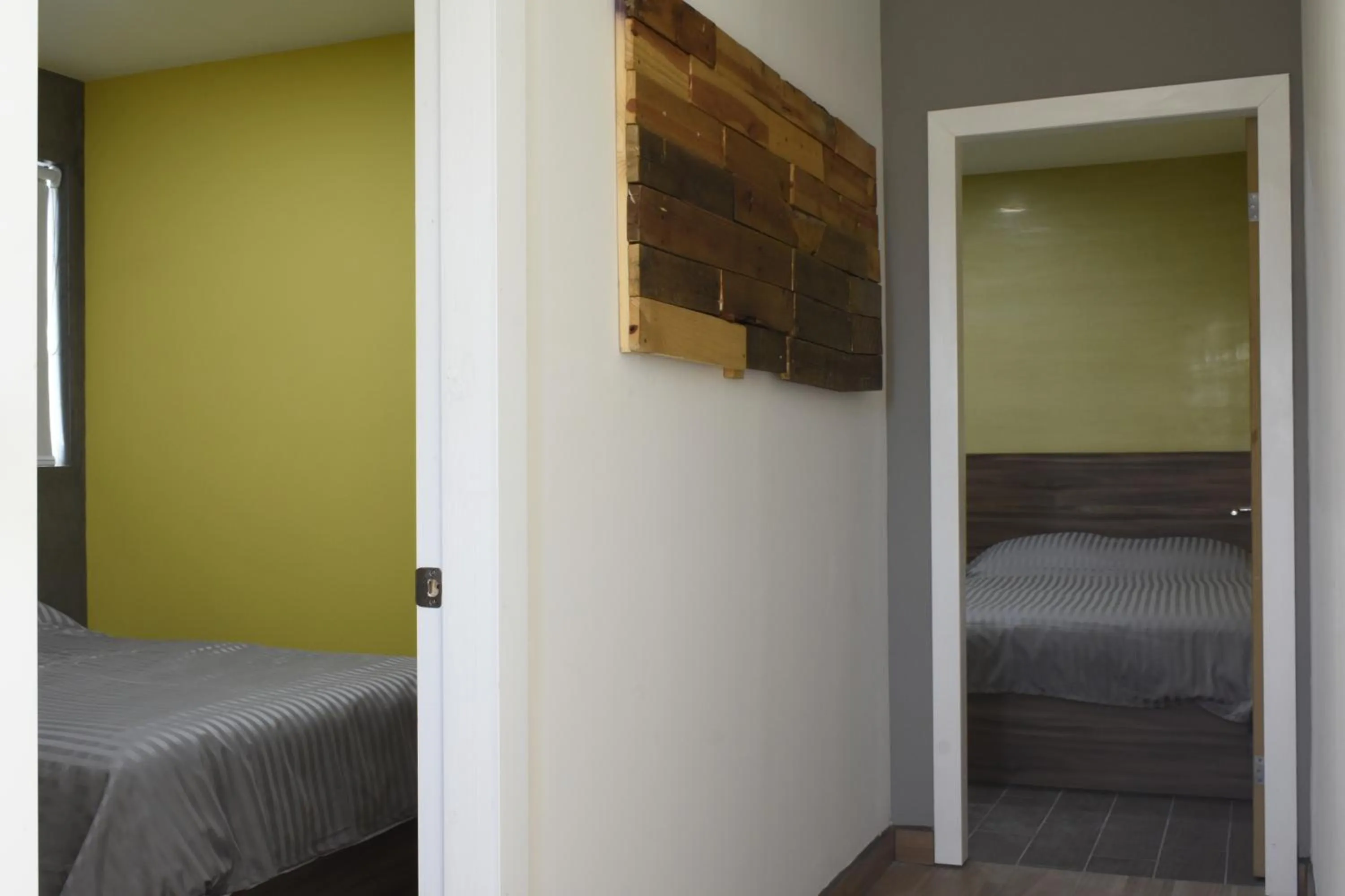 Bed in TJ Border Suites by Hosted by Me