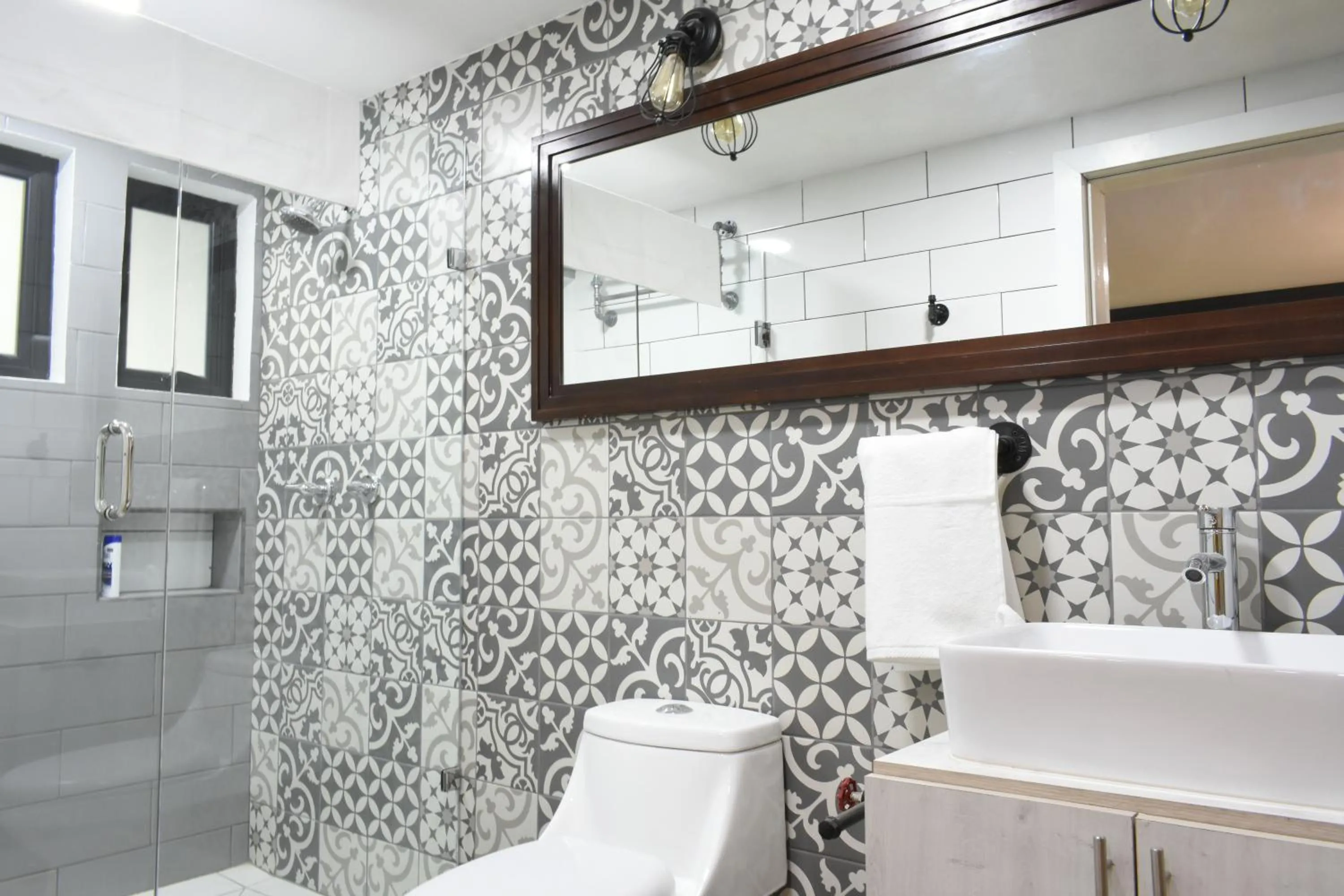 Shower in TJ Border Suites by Hosted by Me