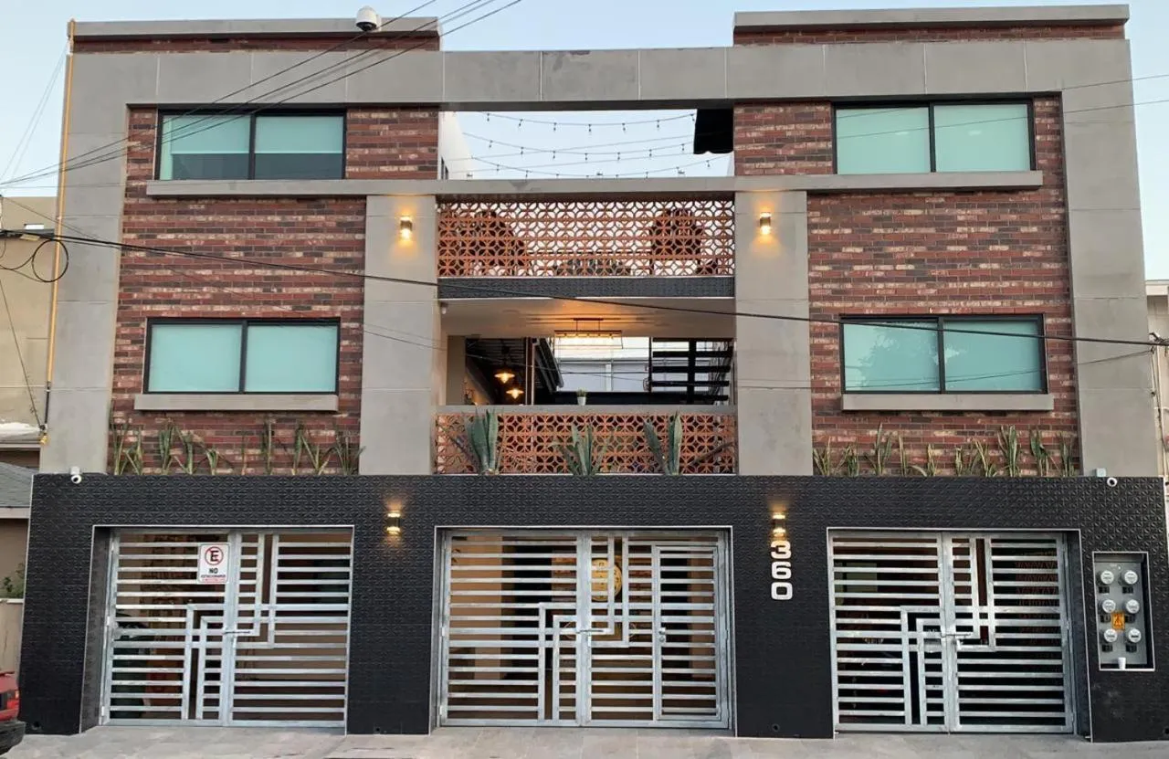 Property building in TJ Border Suites by Hosted by Me