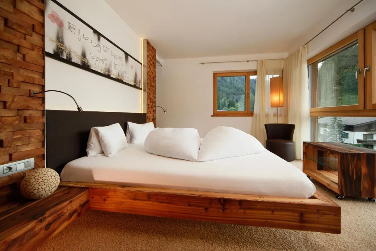 Photo of the whole room, Bed in Hotel Ratschingserhof