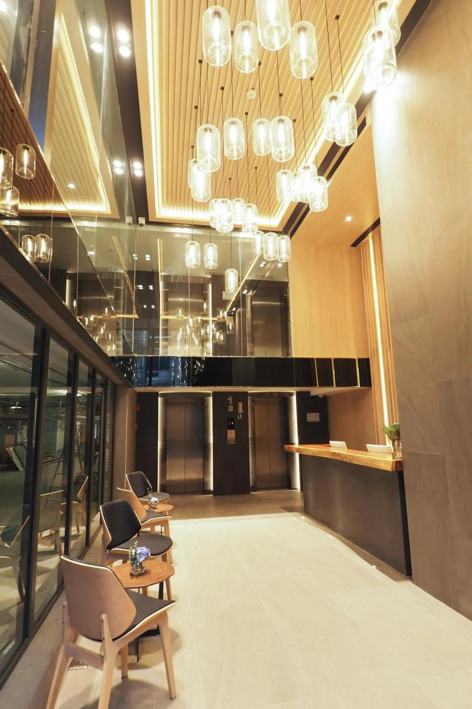 Lobby or reception in The Quarter Phromphong by UHG