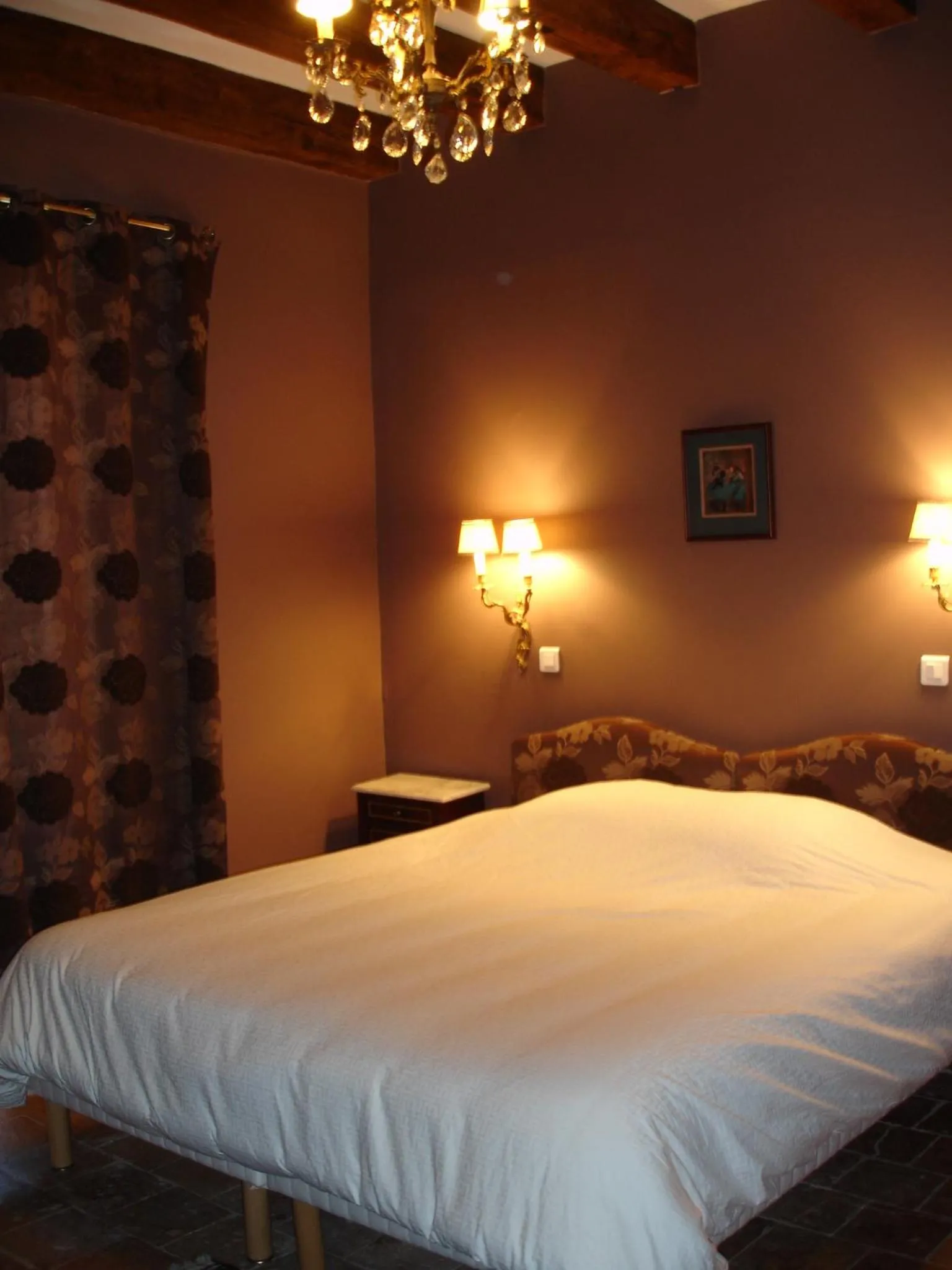 Bed in Le Relais du Lyon d'Or