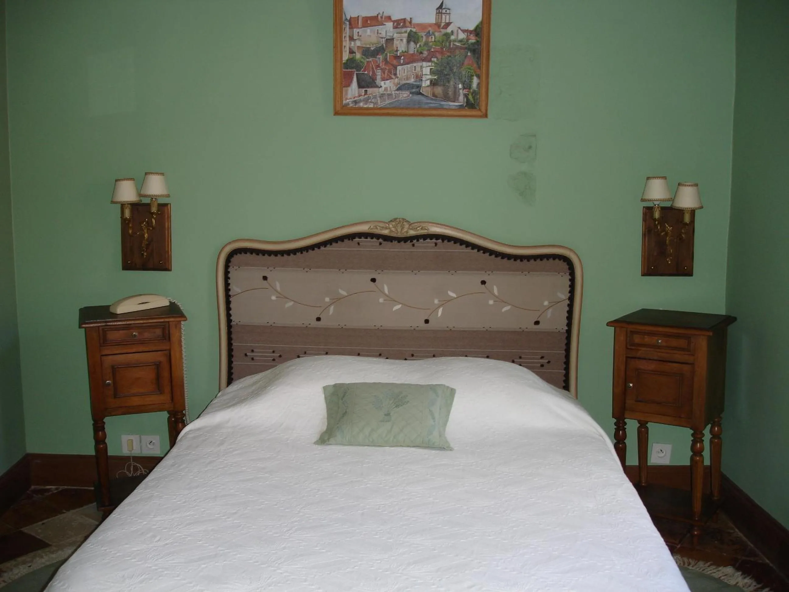 Bed in Le Relais du Lyon d'Or