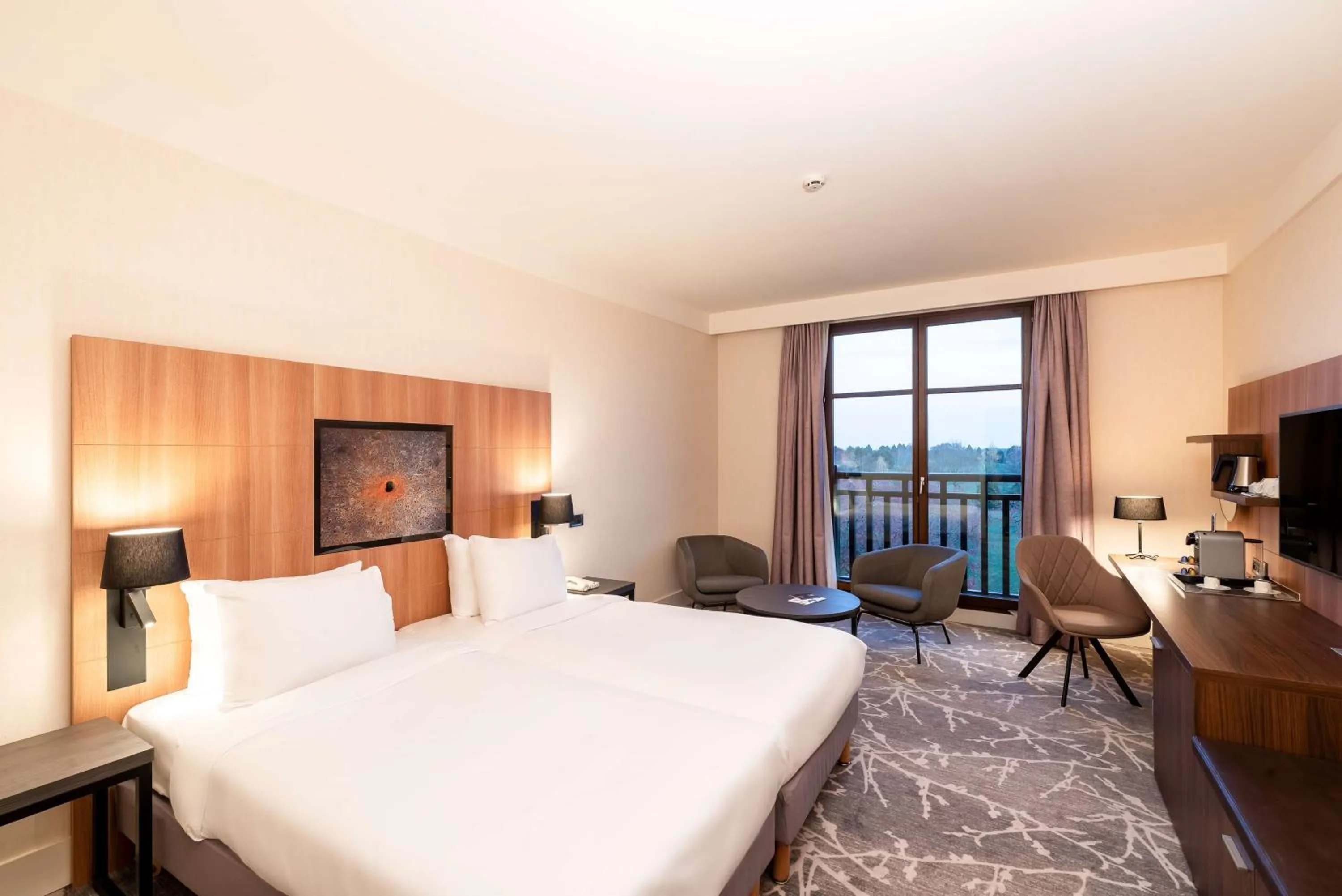 Photo of the whole room, Bed in Radisson Blu Hotel Paris, Marne-la-Vallée