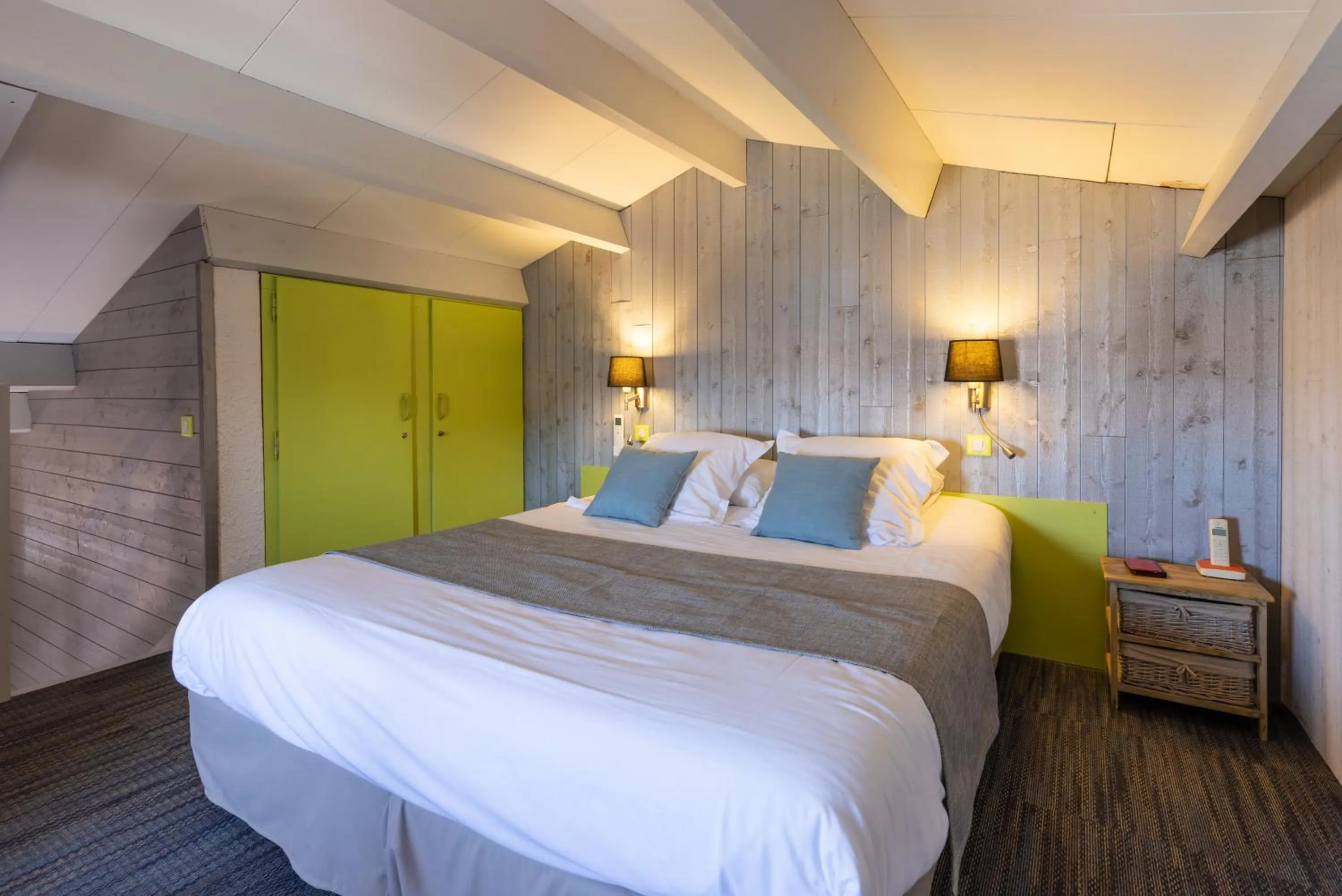 Bed in Logis Hôtel de la Plage