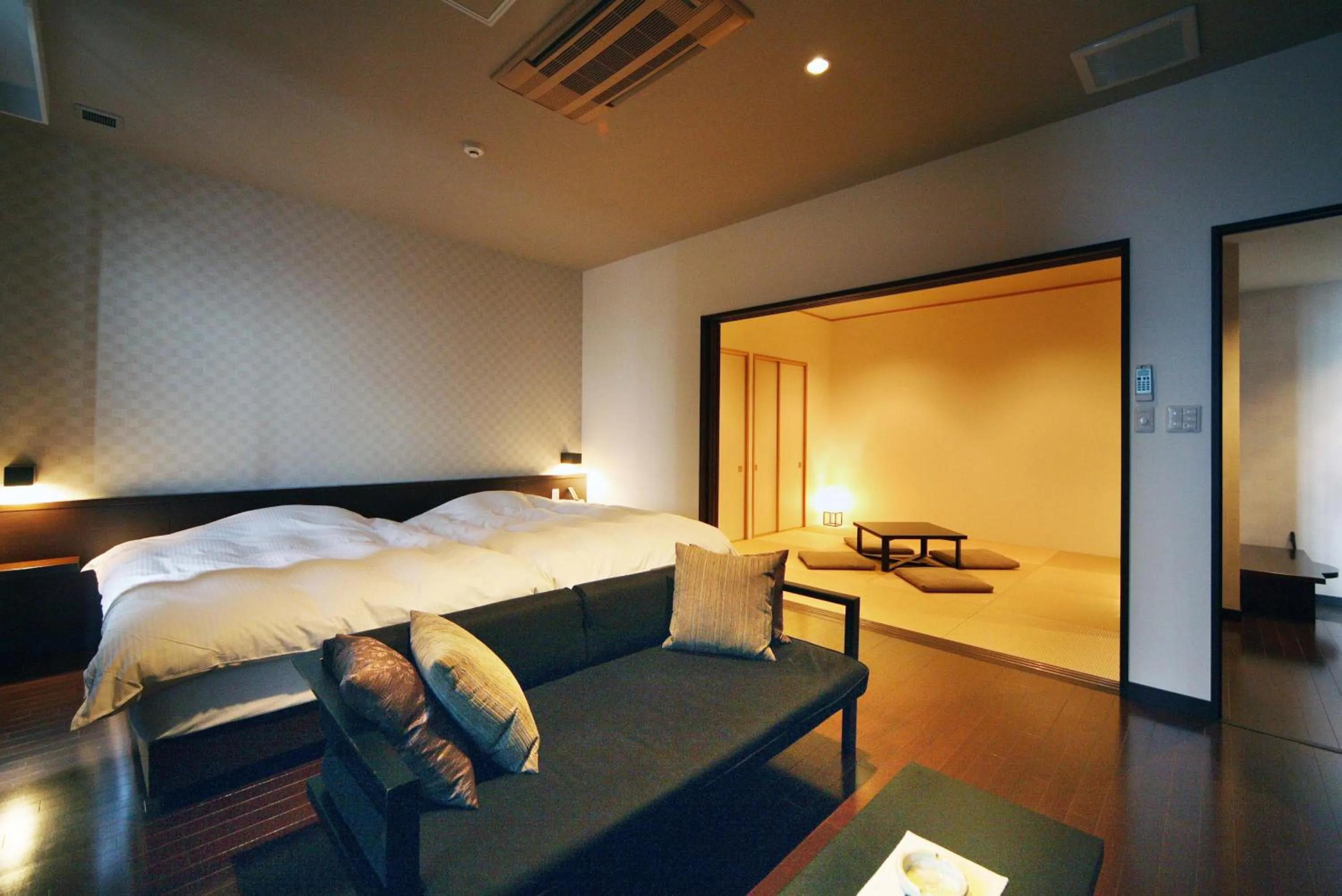 Living room, Bed in AMANE resort SEIKAI