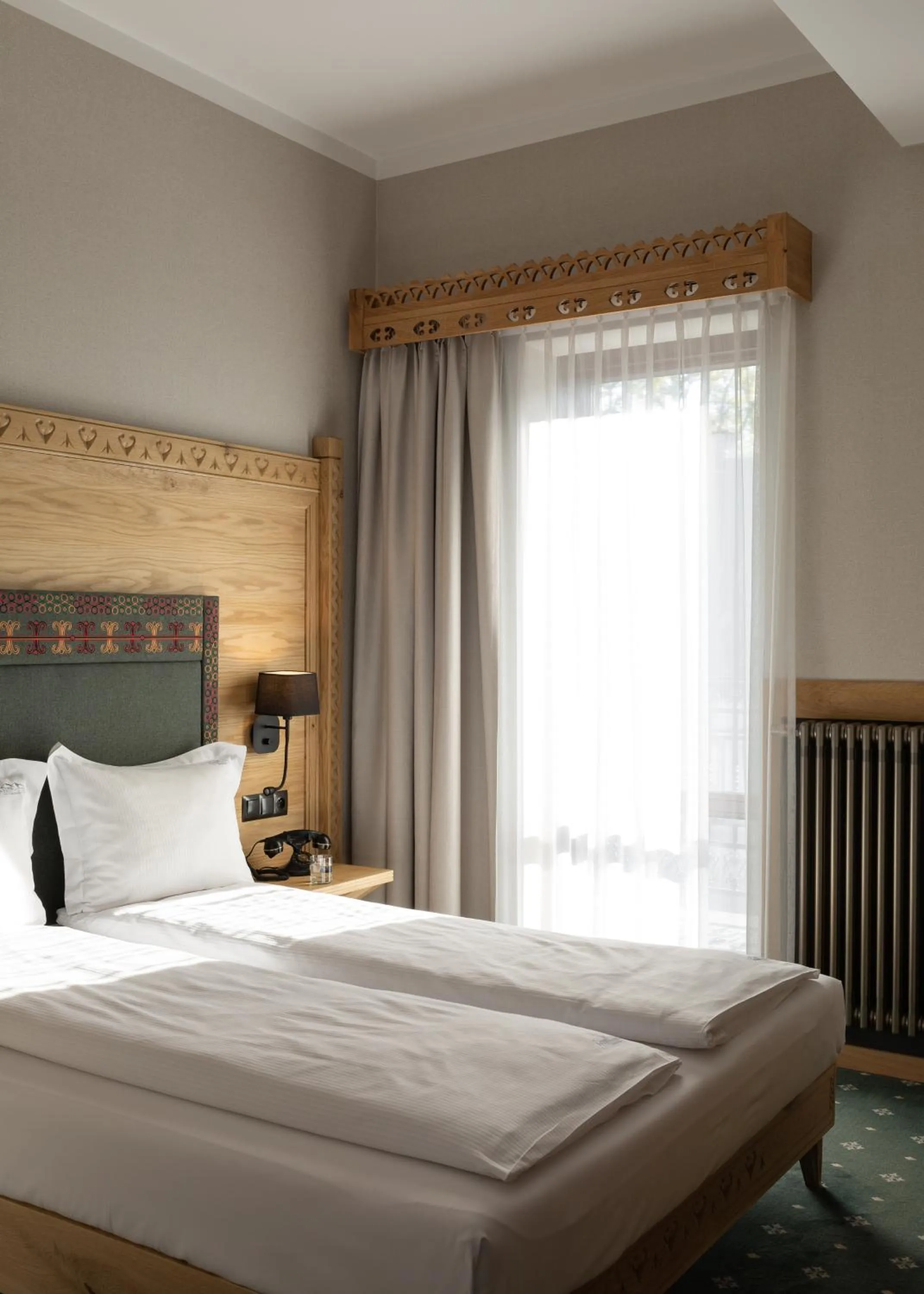 Bed in Aparthotel Cristina