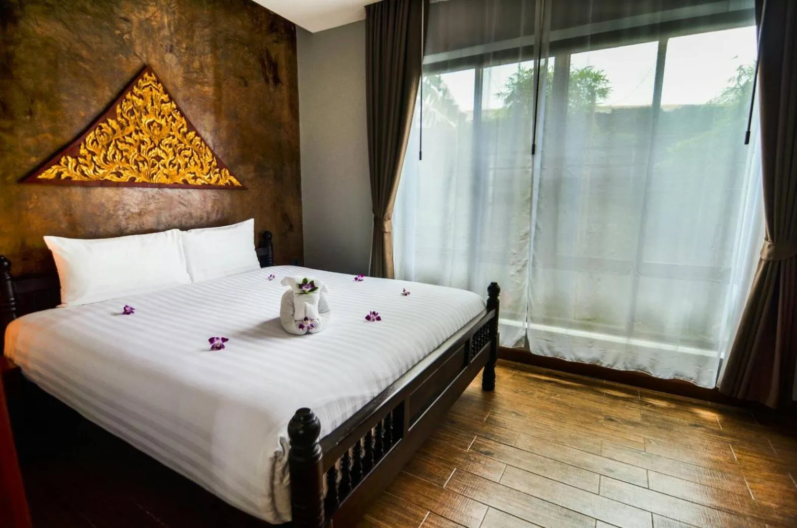 Bed in Coco Paradiso Phuket SHA
