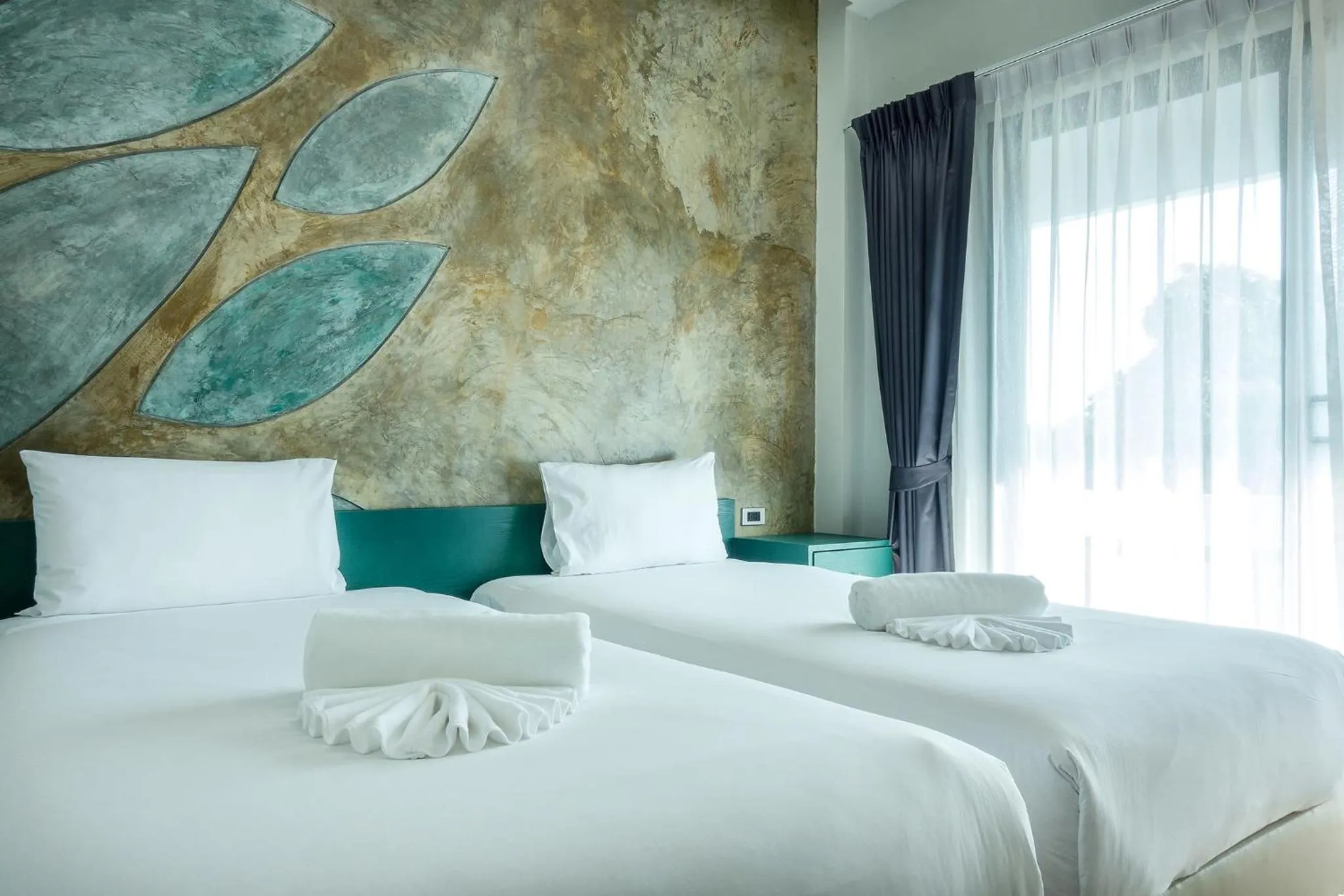 Bed in Coco Paradiso Phuket SHA