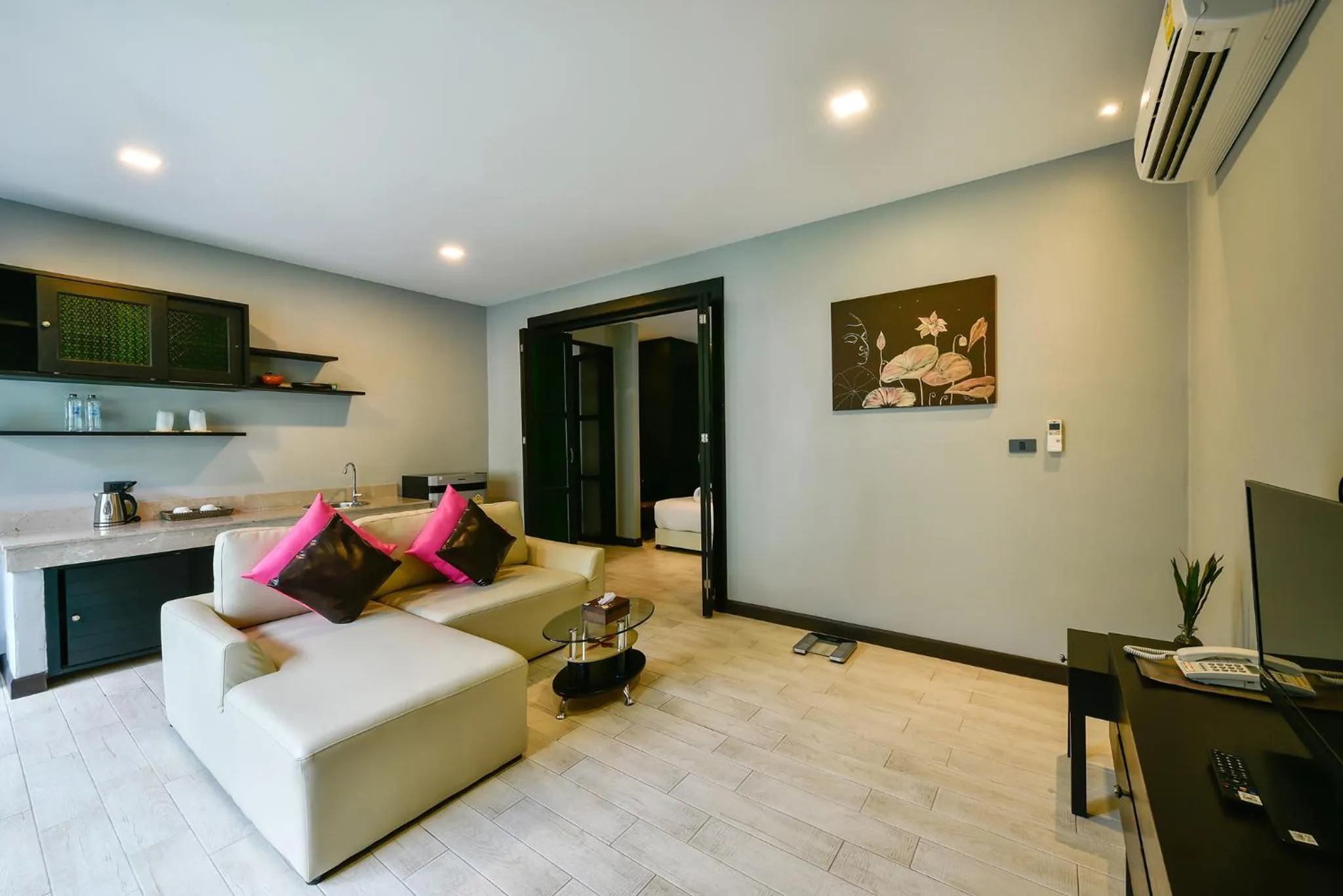 Living room, Bed in Coco Paradiso Phuket SHA