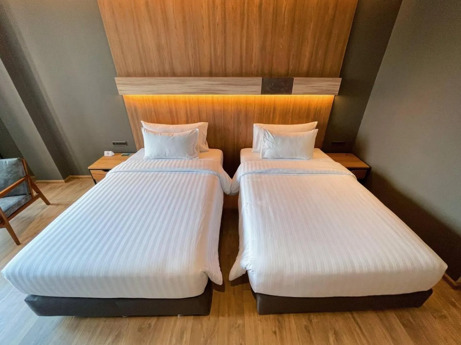 Bed in The Teak Hotel