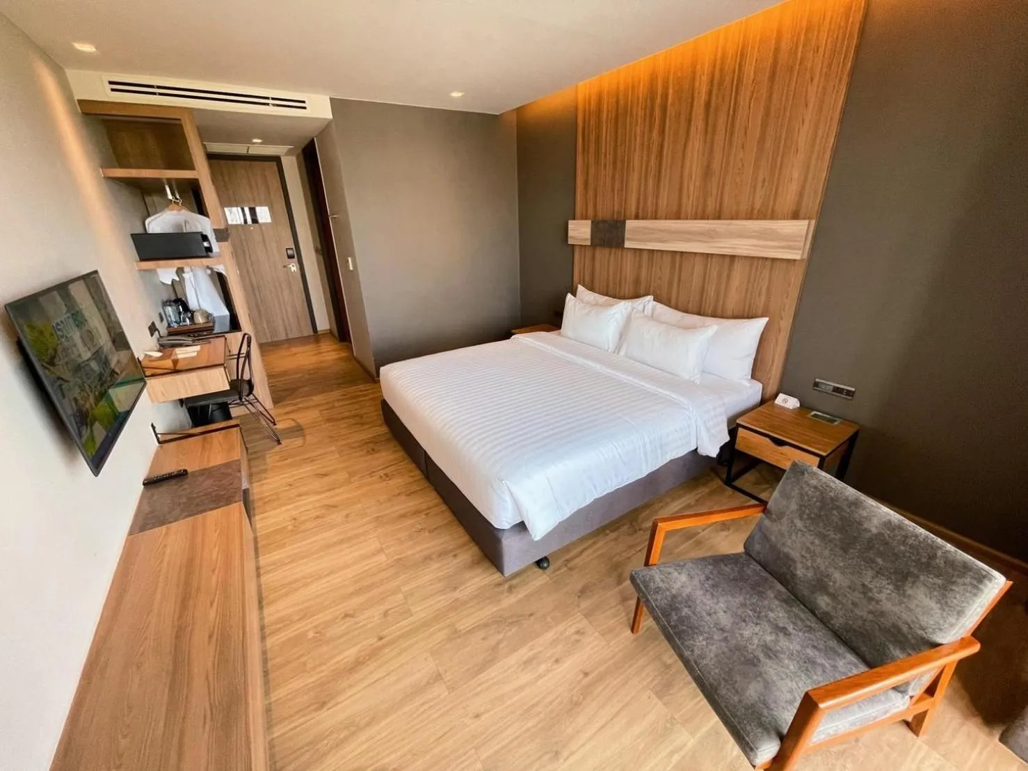 Bed in The Teak Hotel