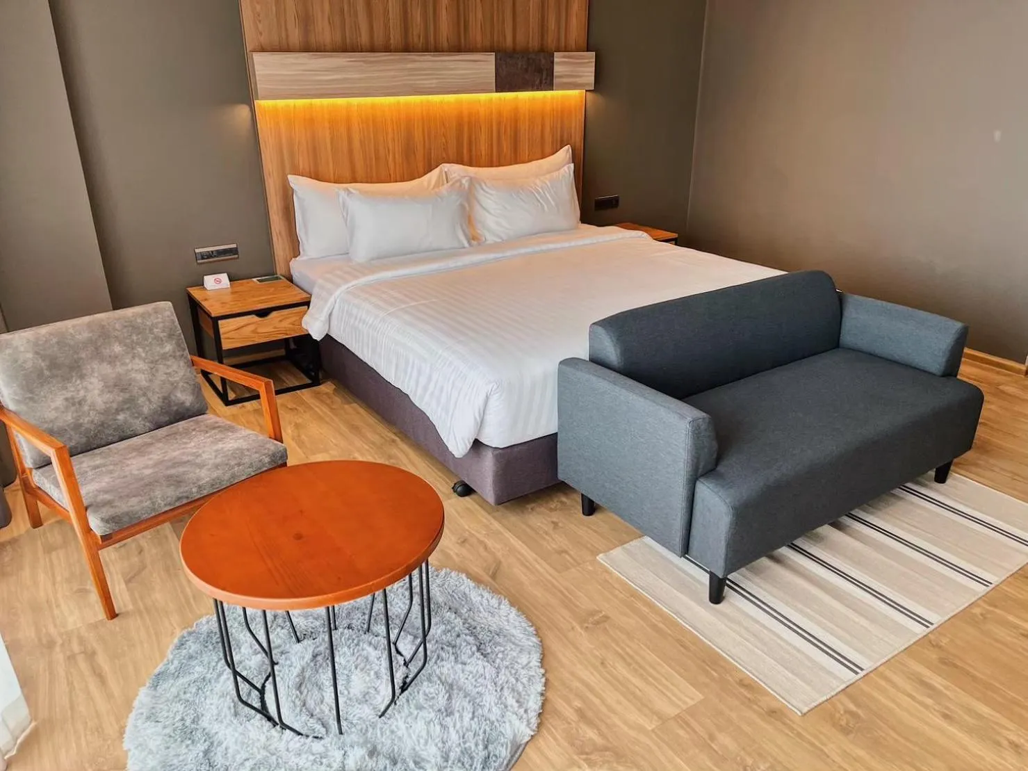 Bed in The Teak Hotel