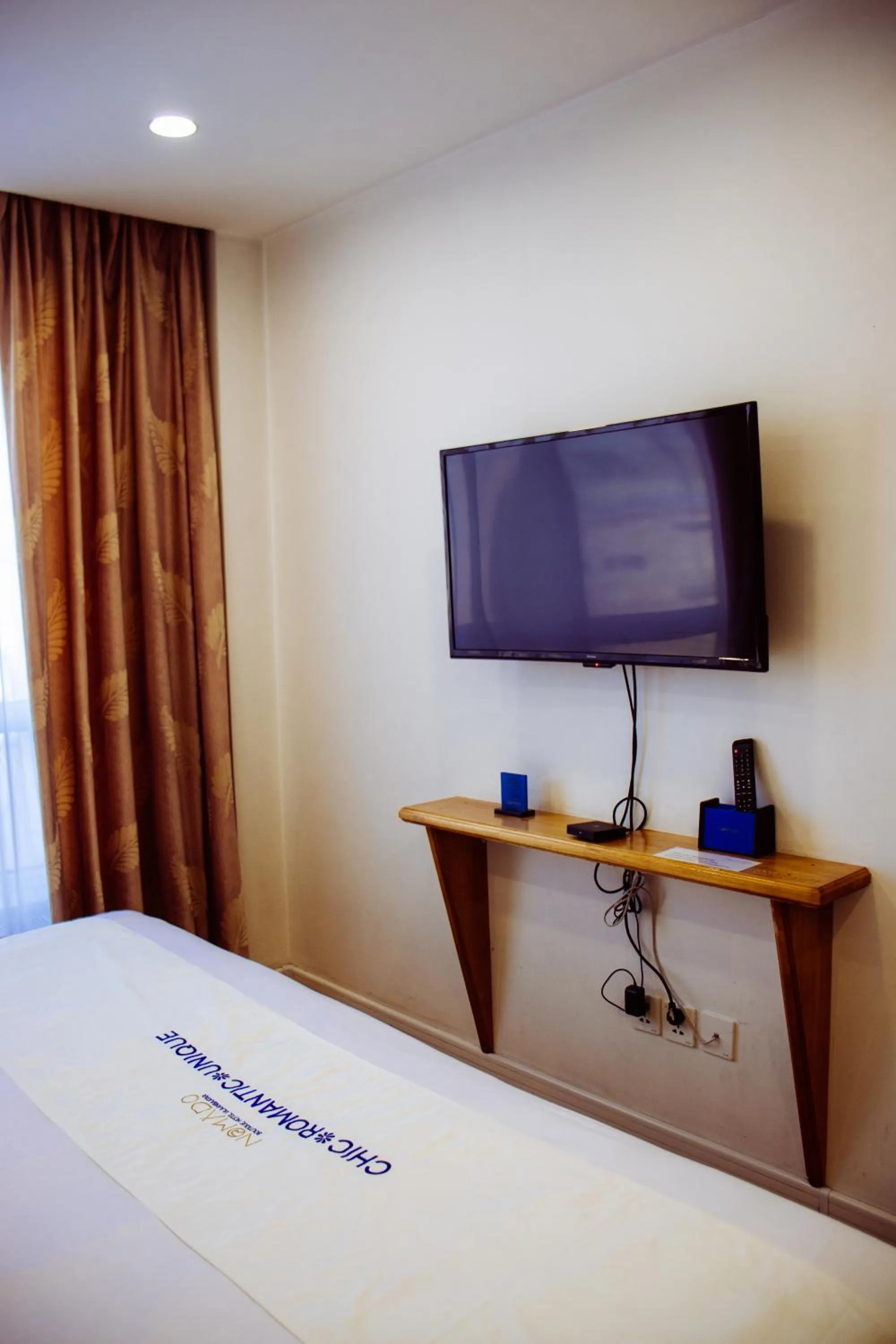 TV and multimedia, Bed in Nomado Boutique Hotel